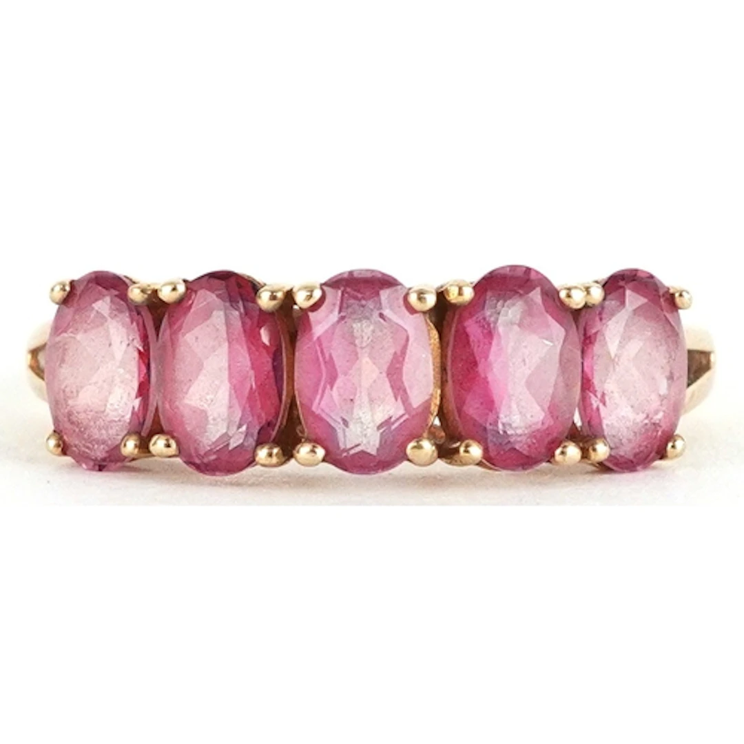9ct gold pink stone half eternity ring, possibly pink topaz,...