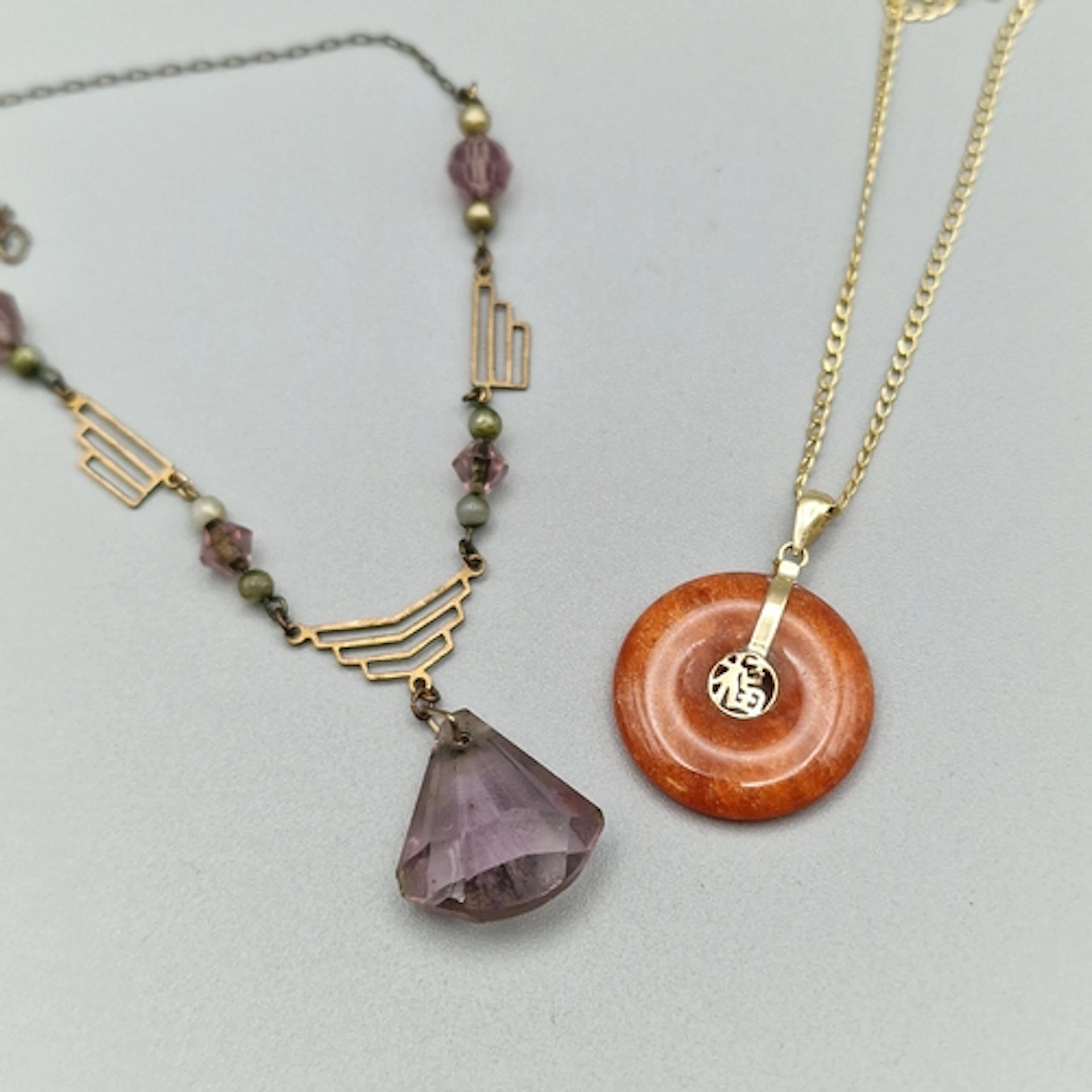 9ct gold chain with Chinese hardstone pendant, together with...
