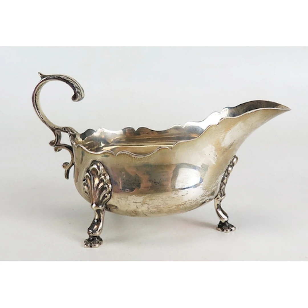 An Edward VII silver sauce boat, maker Martin, Hall & Co, Sh...