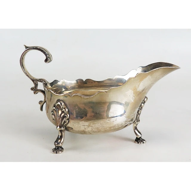 An Edward VII silver sauce boat, maker Martin, Hall & Co, Sh...