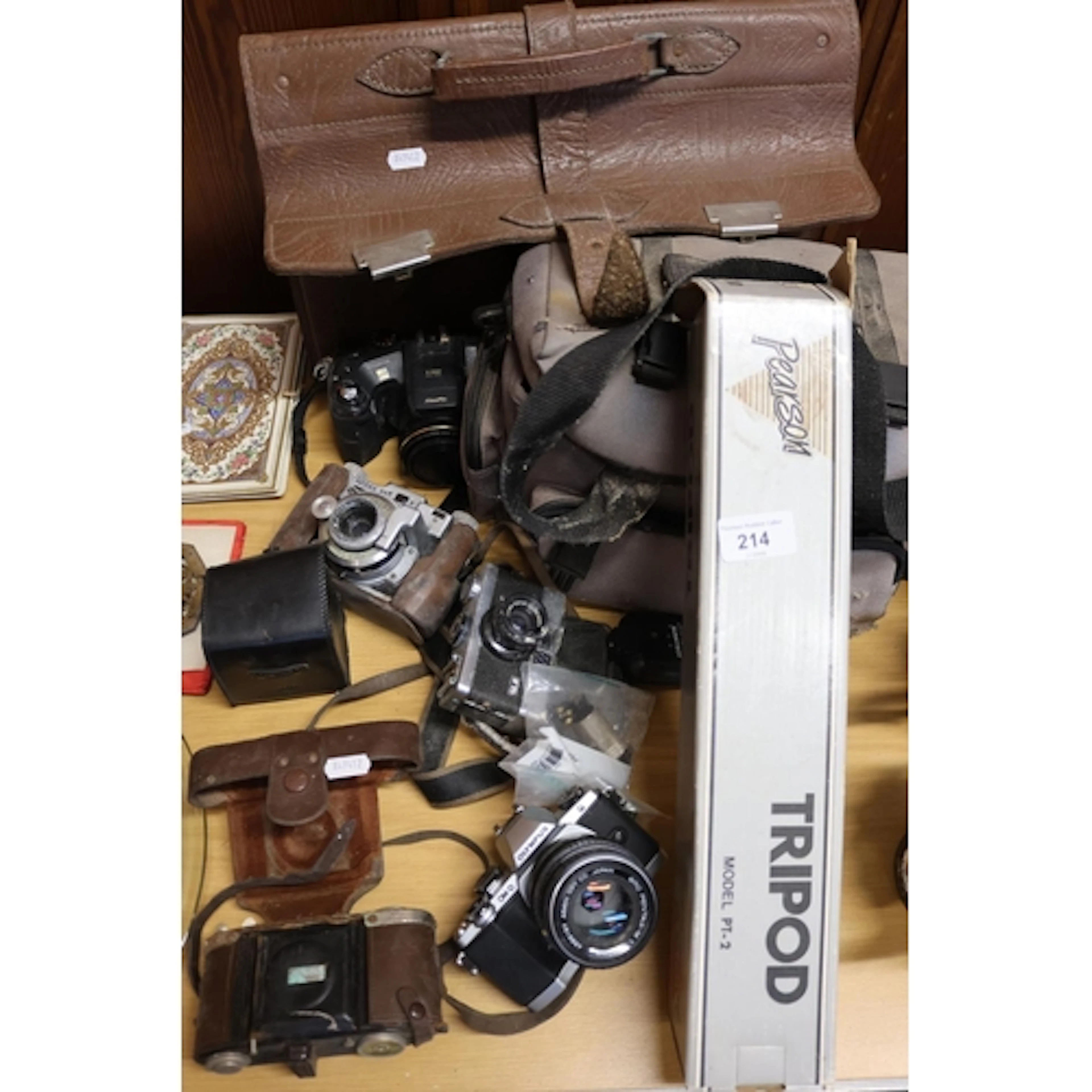 Cameras and accessories to include an Olympus OMB, a Kodak 3...