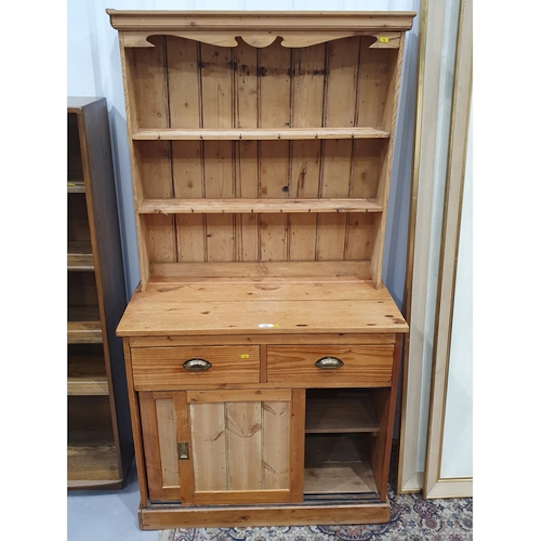 A pine Dresser and Rack fitted two short drawers above pair ...