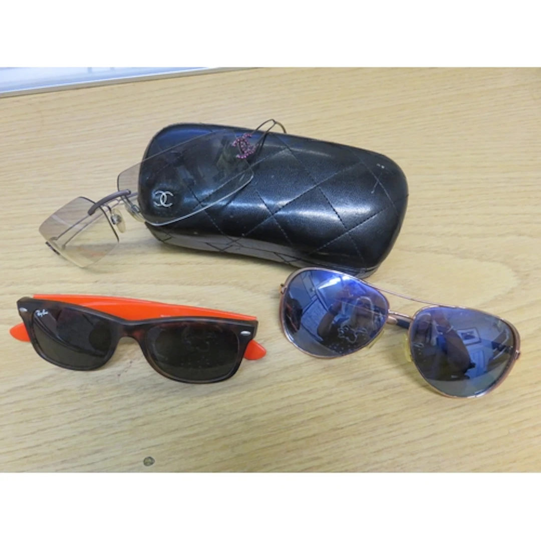 Pair of Chanel sunglasses with original case, another pair b...