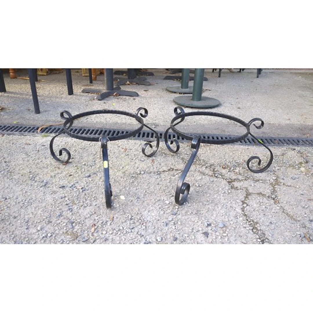 A pair of black-painted wrought-iron jardinière stands, each...