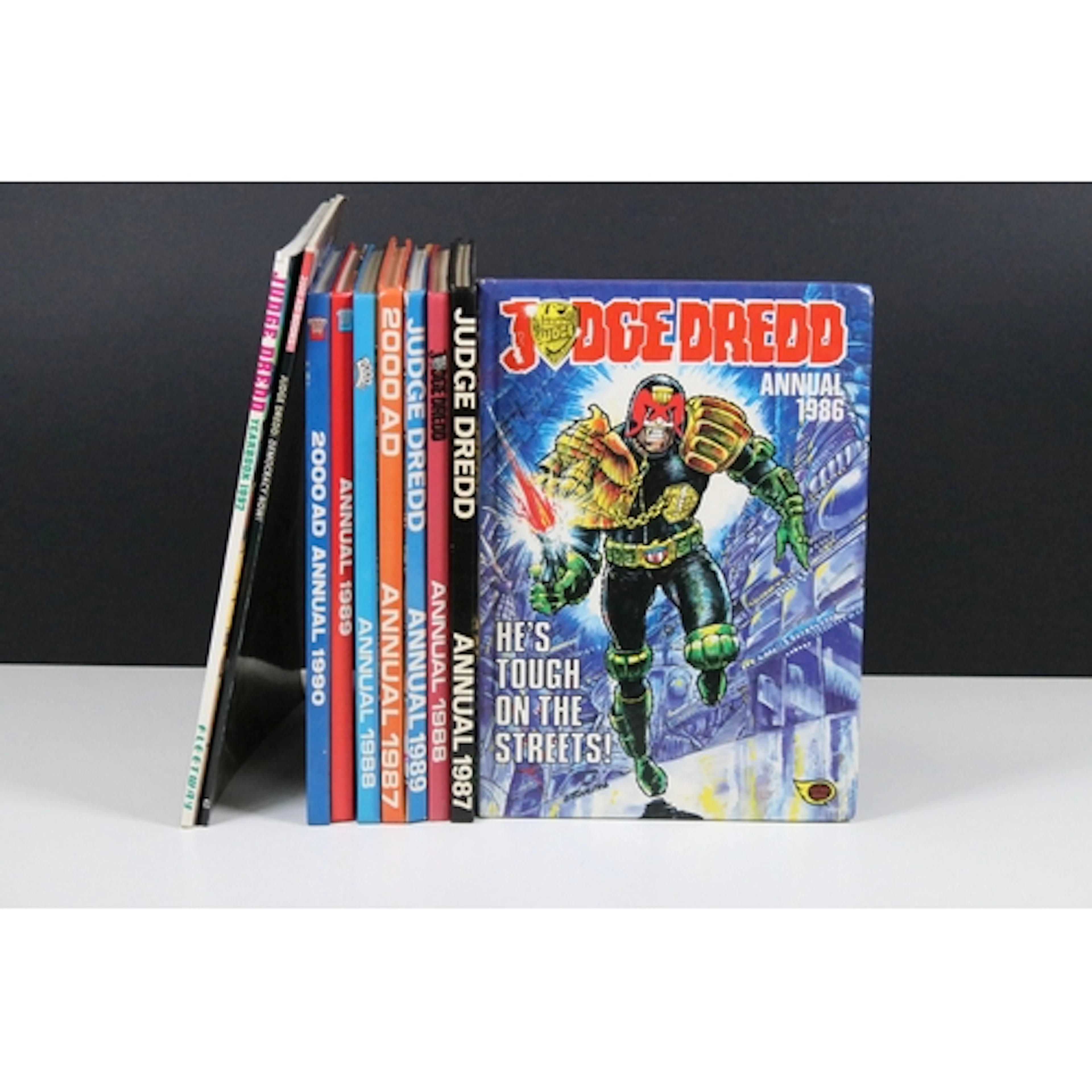 Four Judge Dredd annuals (1986-1989), together with four 200...