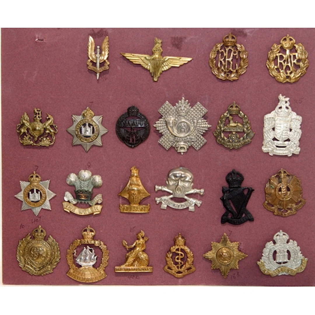 A good carded selection of military cap badges, various eras...