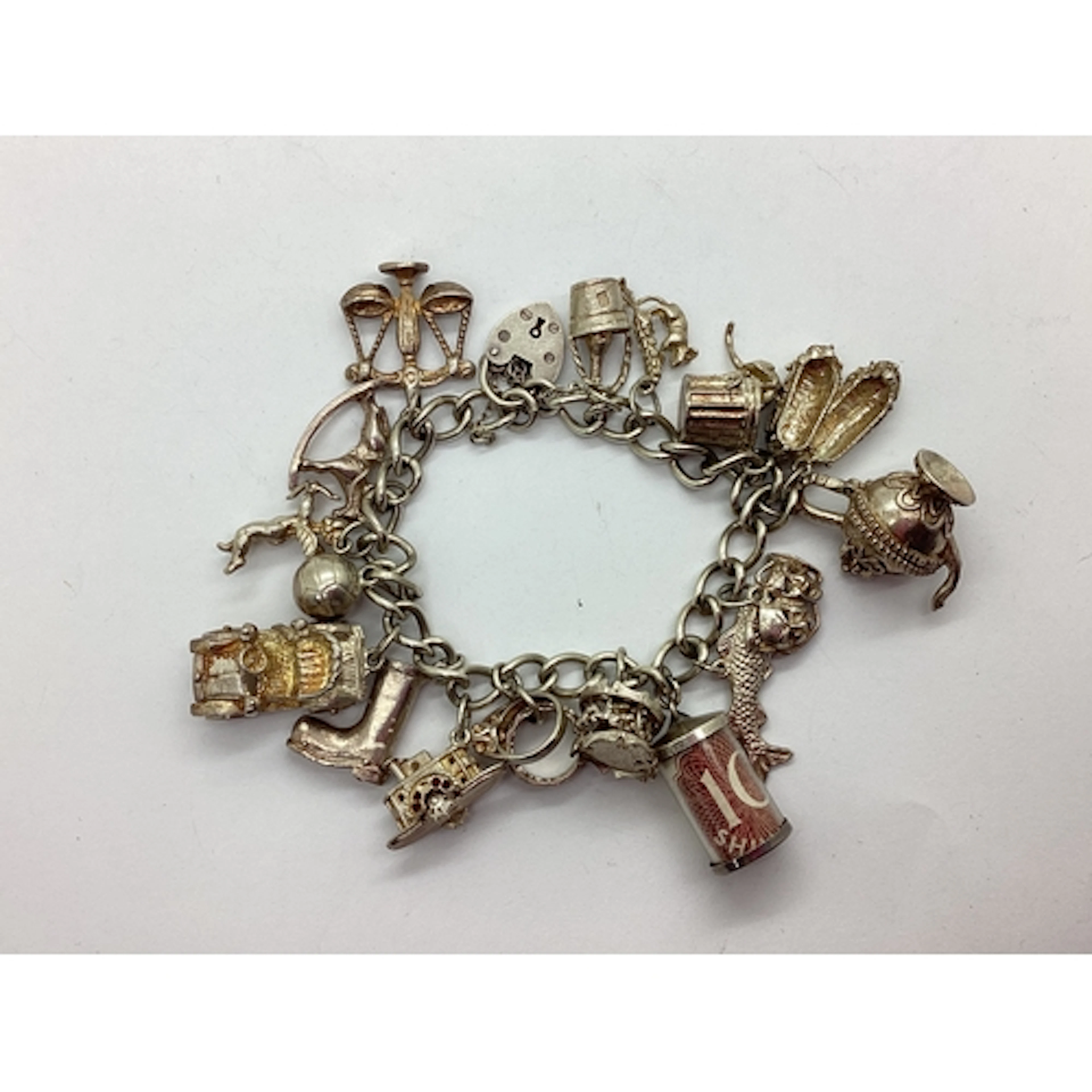 A Highly Decorative Hallmarked Silver Curb Link Bracelet, to...
