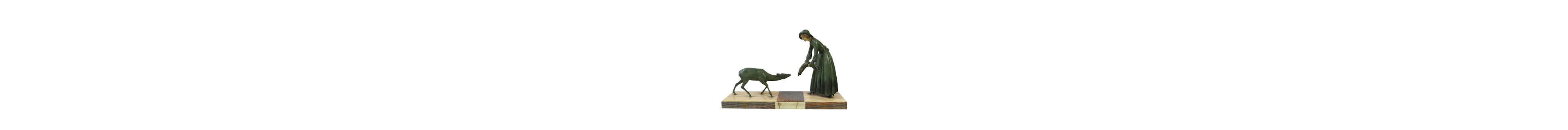AN ART DECO PAINTED SPELTER GROUP CIRCA 1930 depicting a wom...