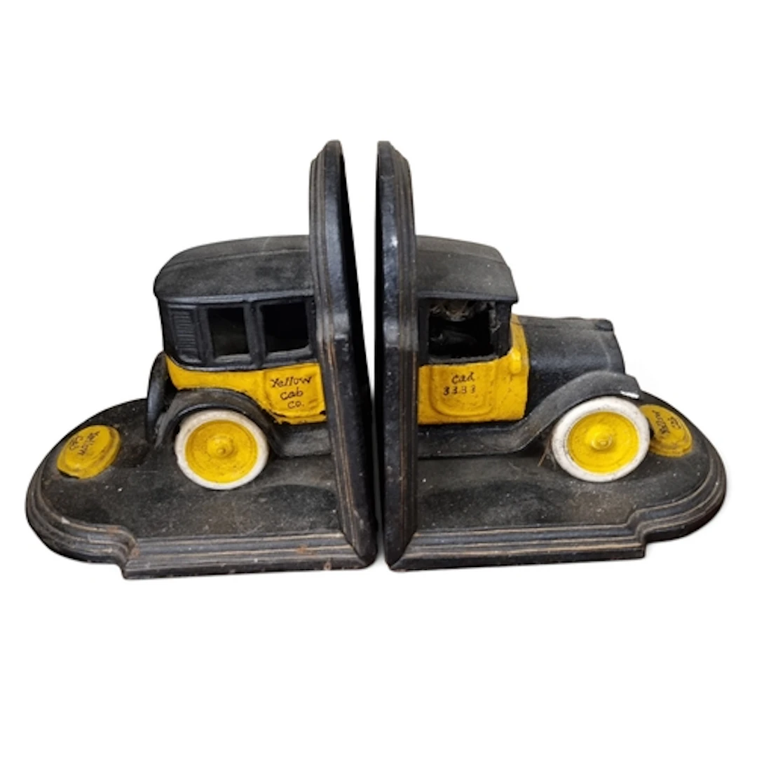 A pair of Cast Iron Bookends. H 19 cm approx.