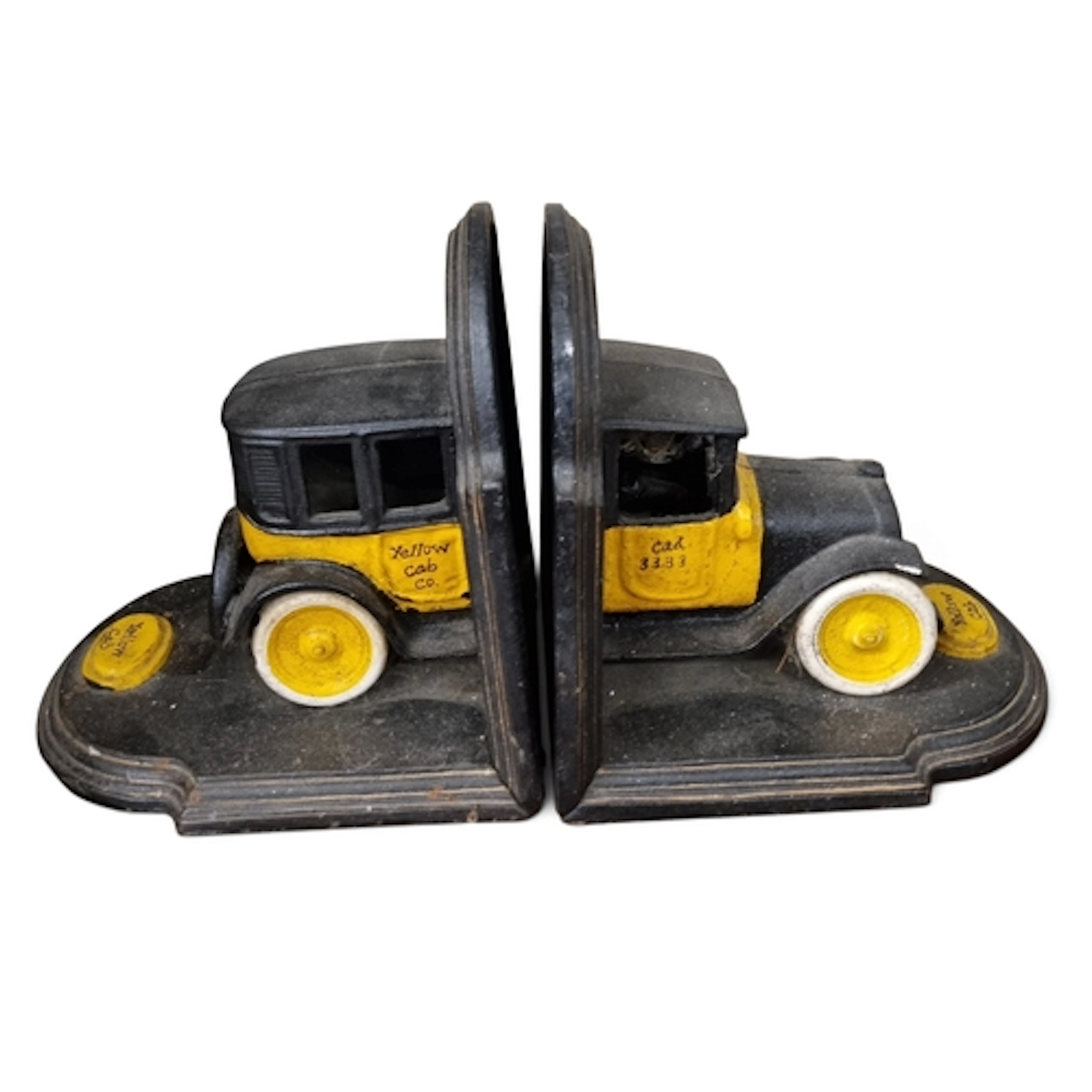 A pair of Cast Iron Bookends. H 19 cm approx.