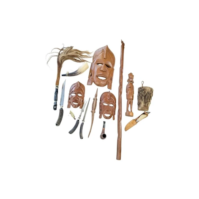 A collection of vintage 20th century hand carved wooden East...