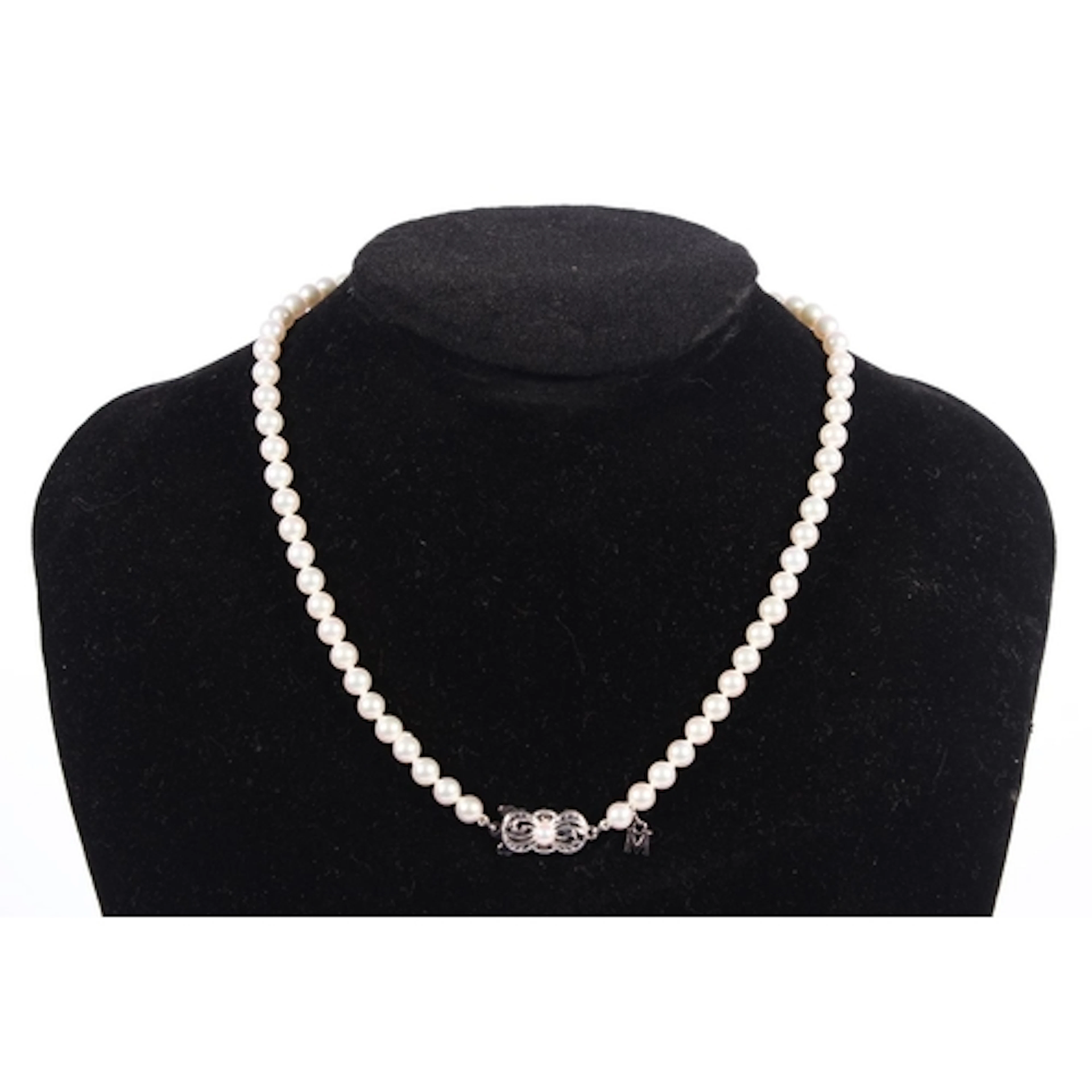 18ct white gold clasped Mikimoto strand of Akoya pearls, 38c...