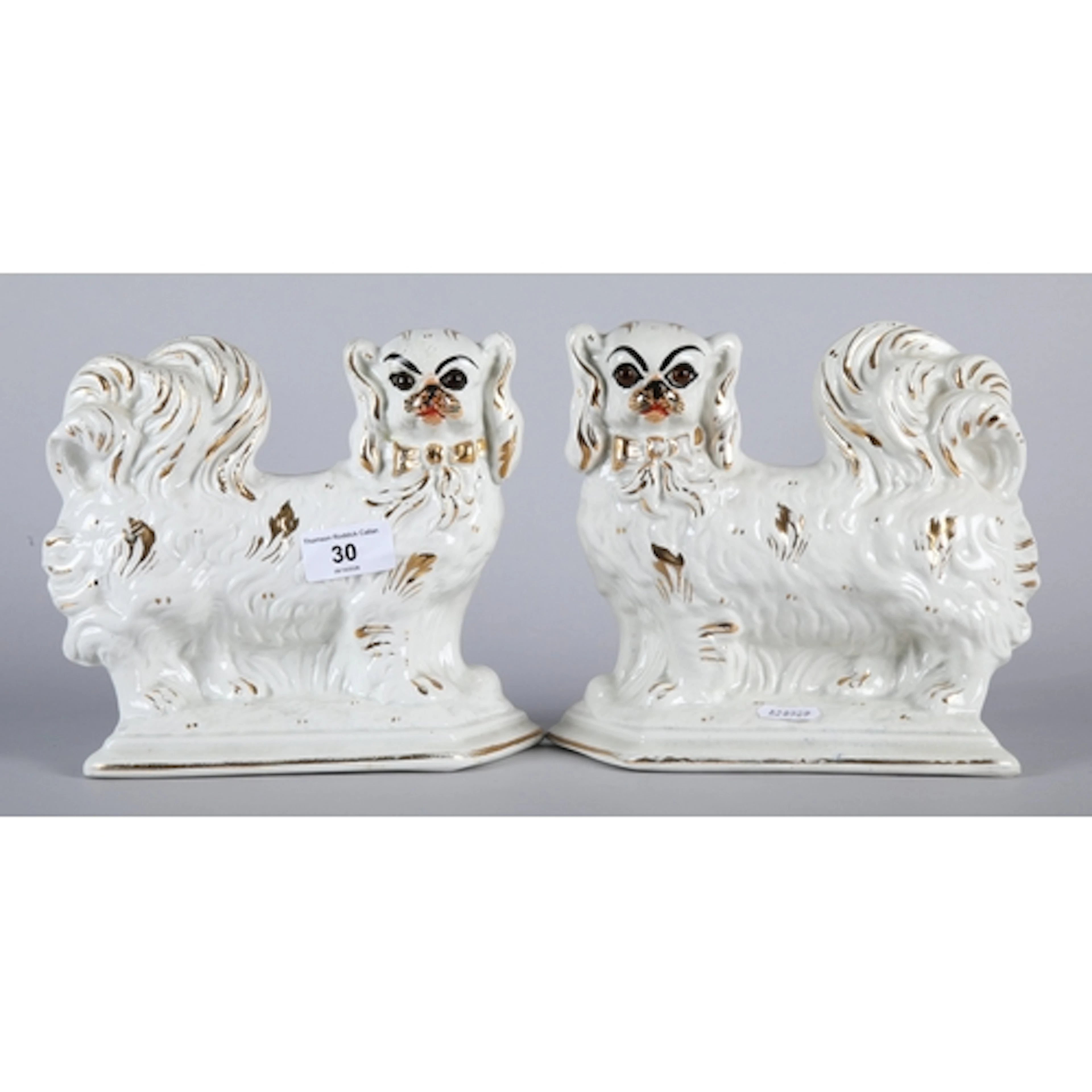 Pair of Staffordshire style Pekingese, 18.5cm H.