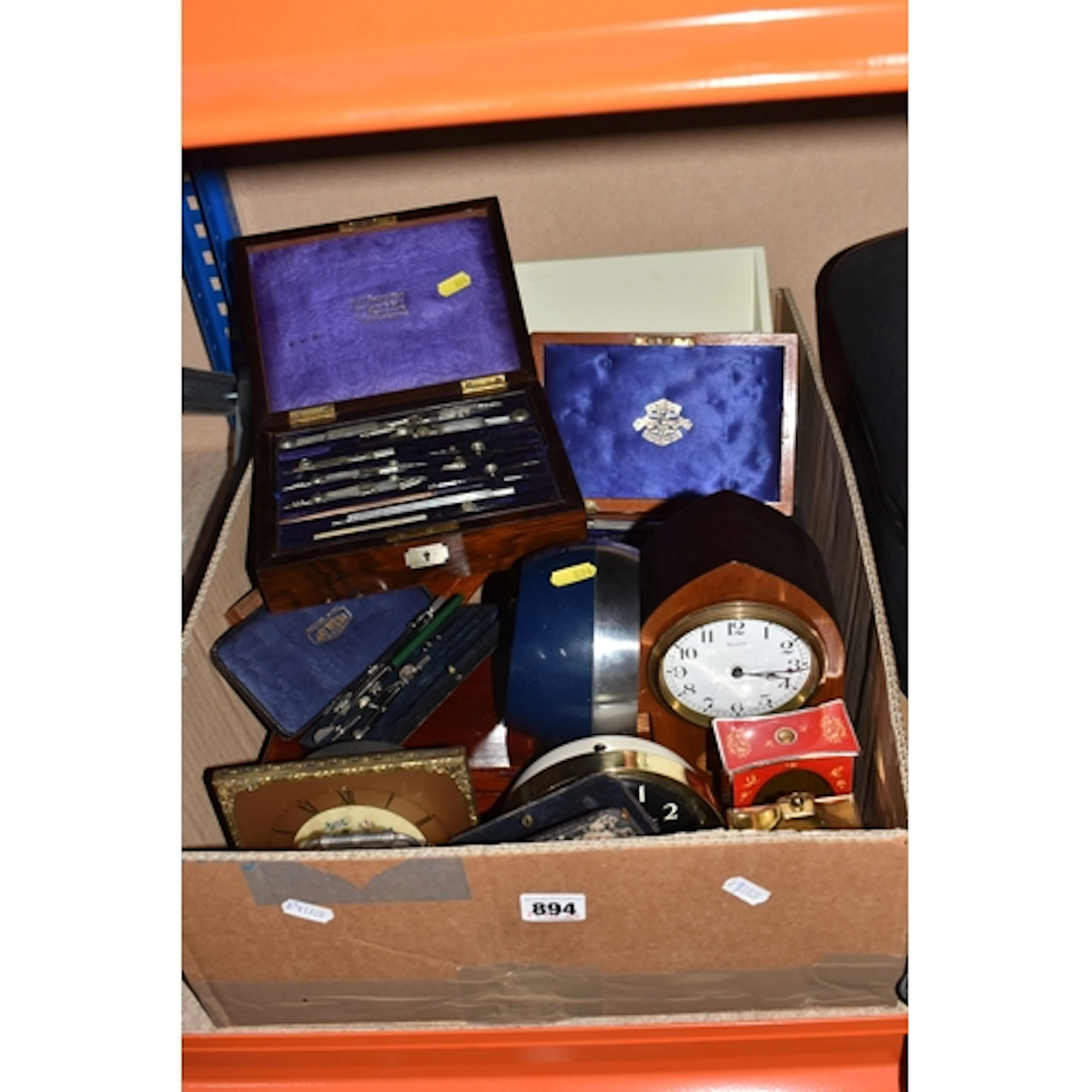 A BOX OF SUNDRIES to include a group of clocks comprising a ...