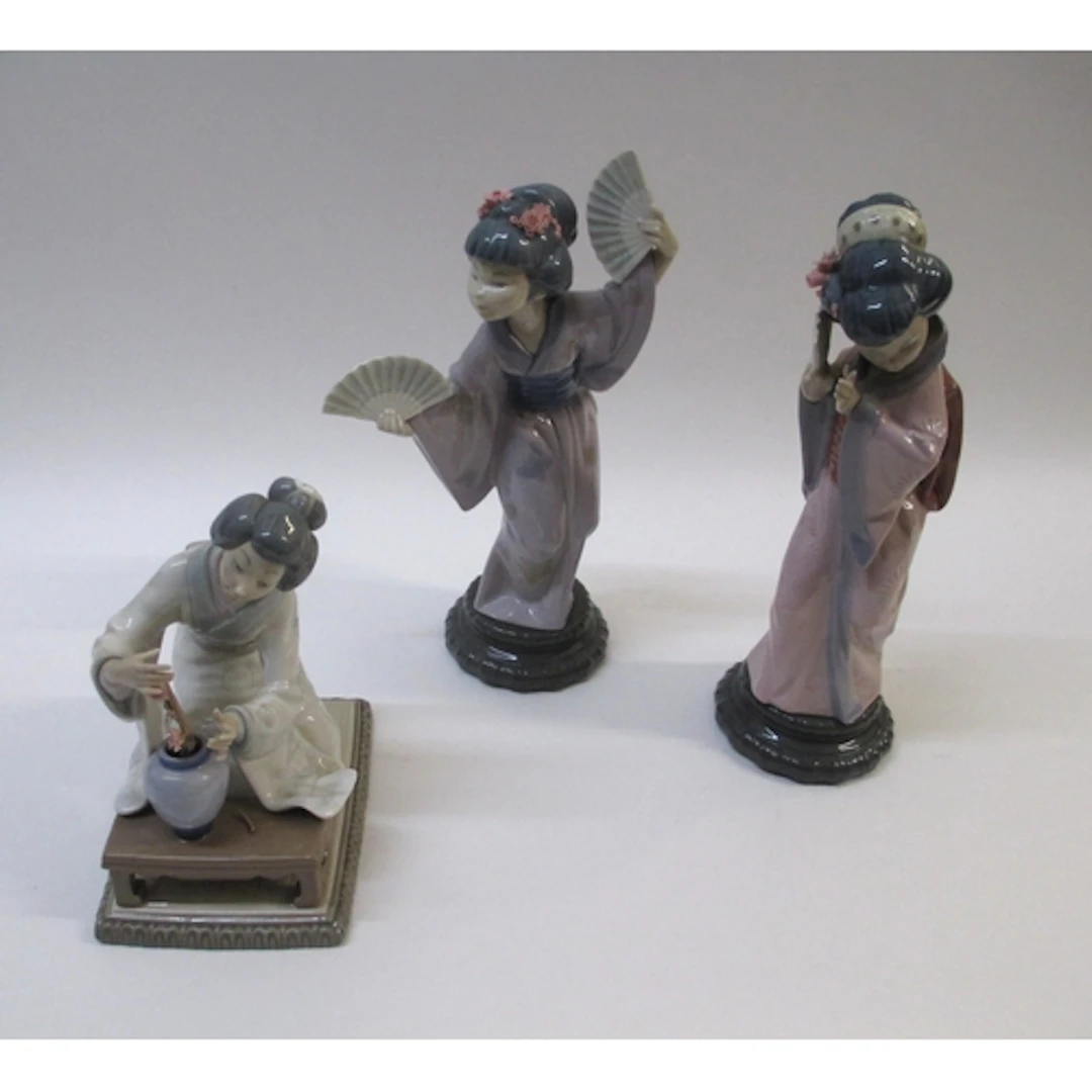 Three Lladro porcelain figures of Japanese girls, numbers 49...