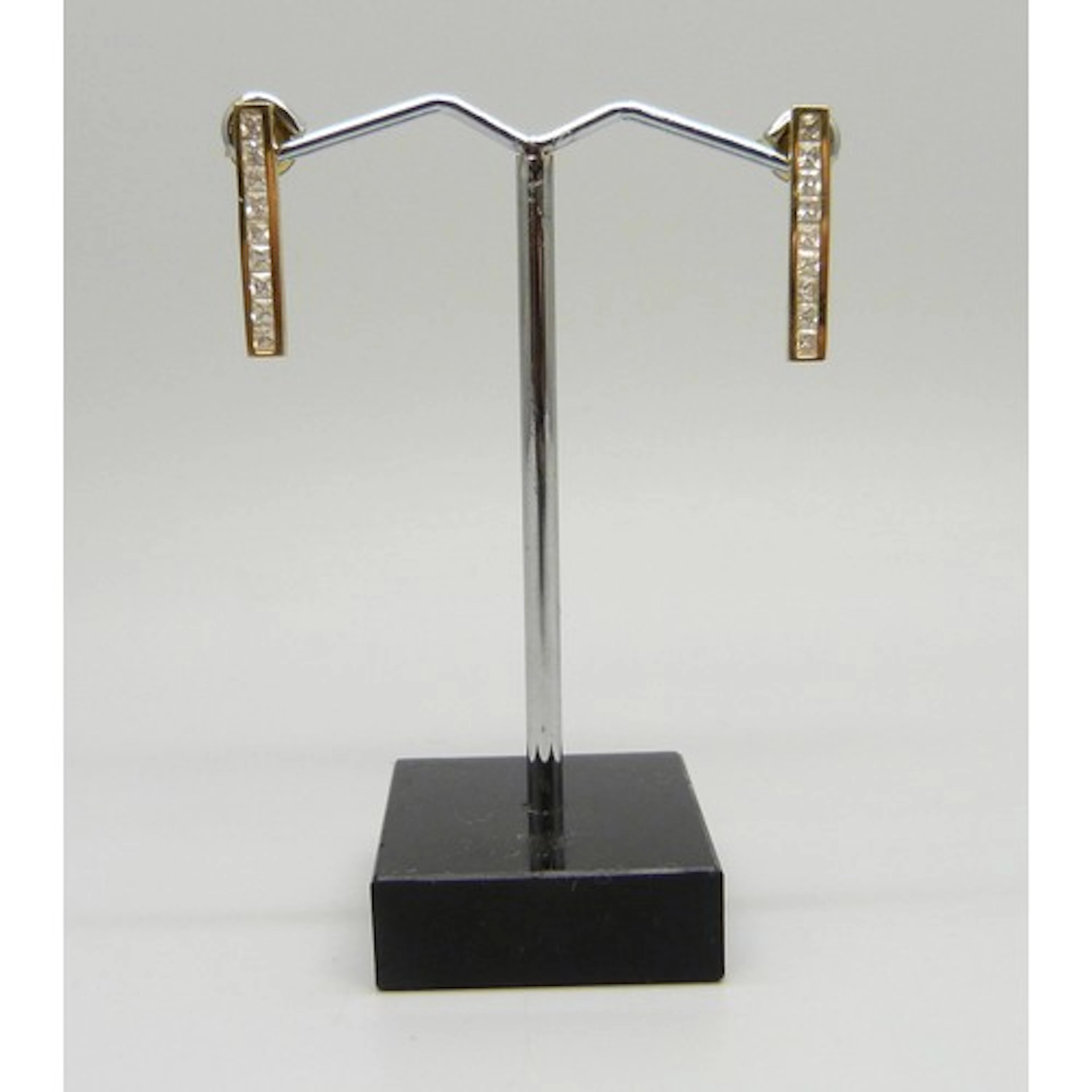 A pair of 9ct gold cubic zirconia drop bar earrings, 2cm, 1....