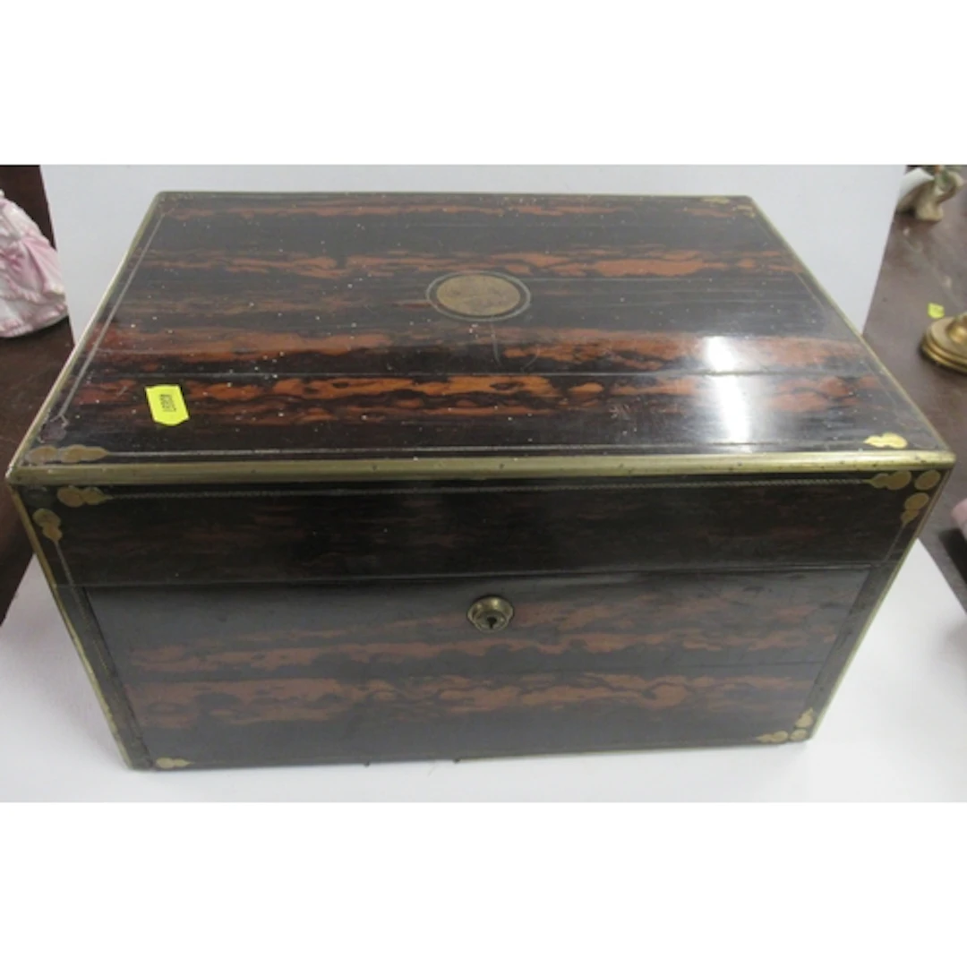 A 19th century coromandel and brass inlay vanity box, with f...