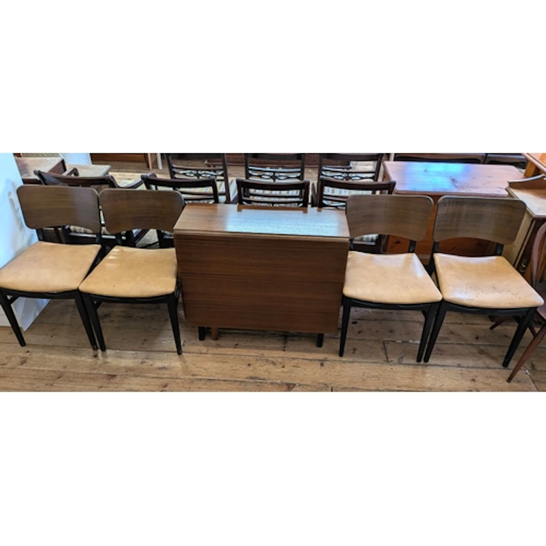 A retro walnut gate legged style dining table and four panel...