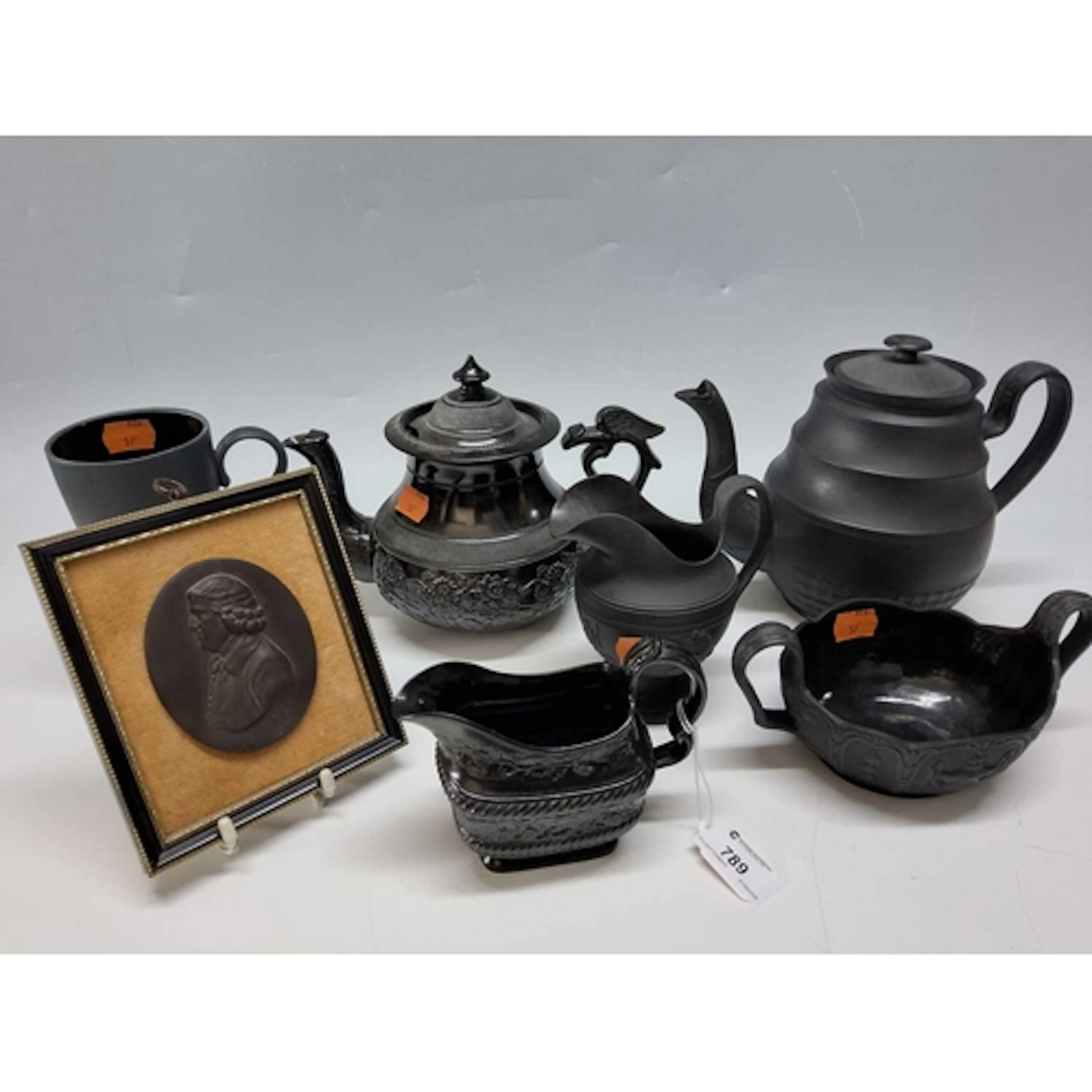 A GROUP OF BLACK BASALT POTTERY BY WEDGWOOD AND OTHERS, comp...