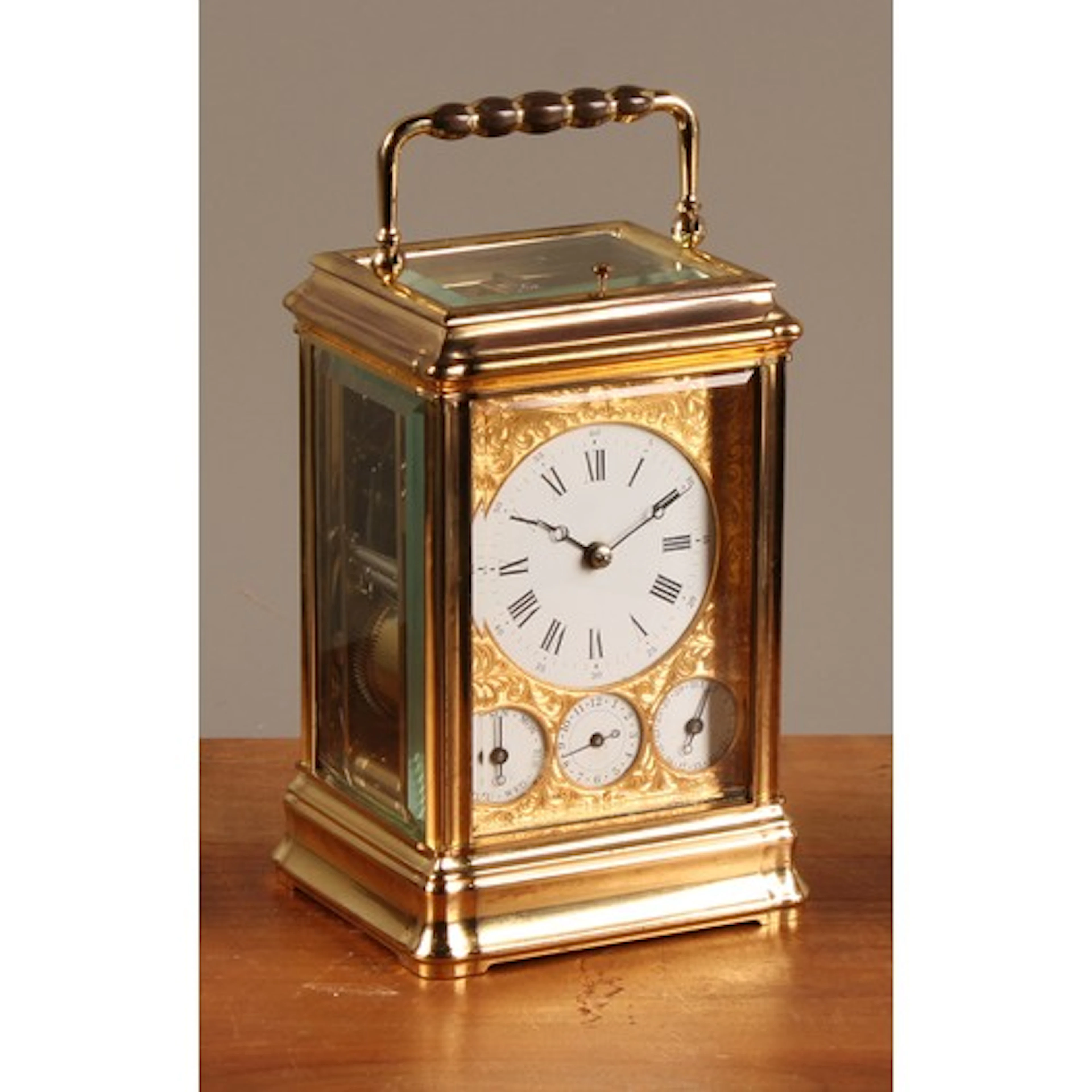 A French brass gorge cased repeating calendar carriage clock...