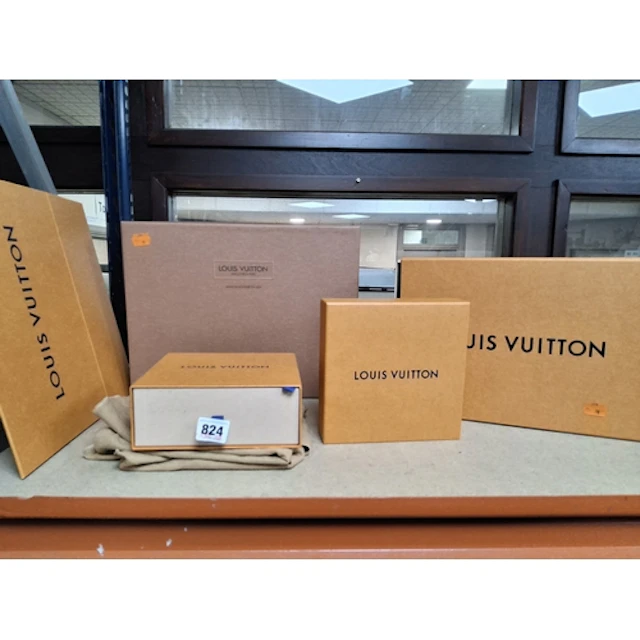 A SMALL GROUP OF LOUIS VUITTON PACKAGING to include a large ...