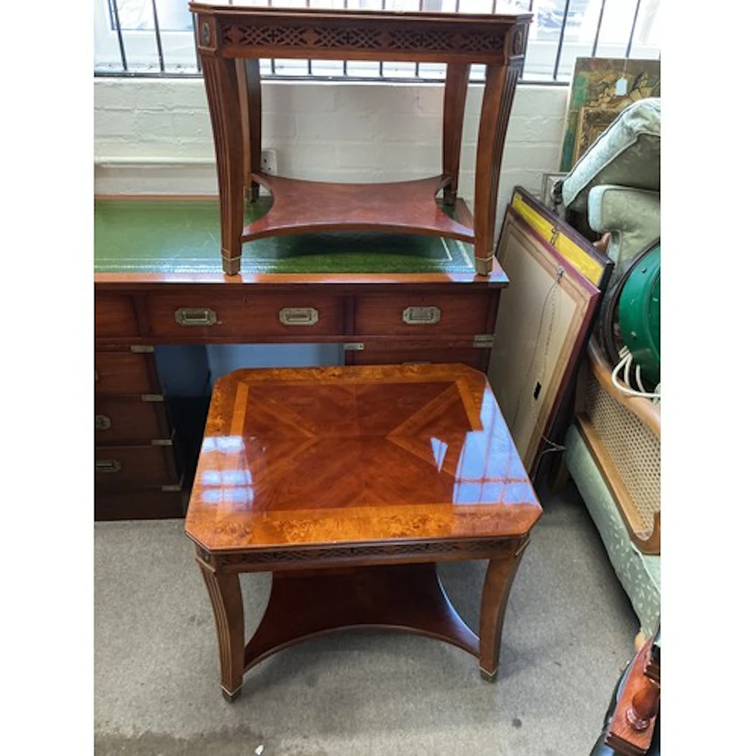 A pair of coffee tables with quarter veneered tops, approx h...