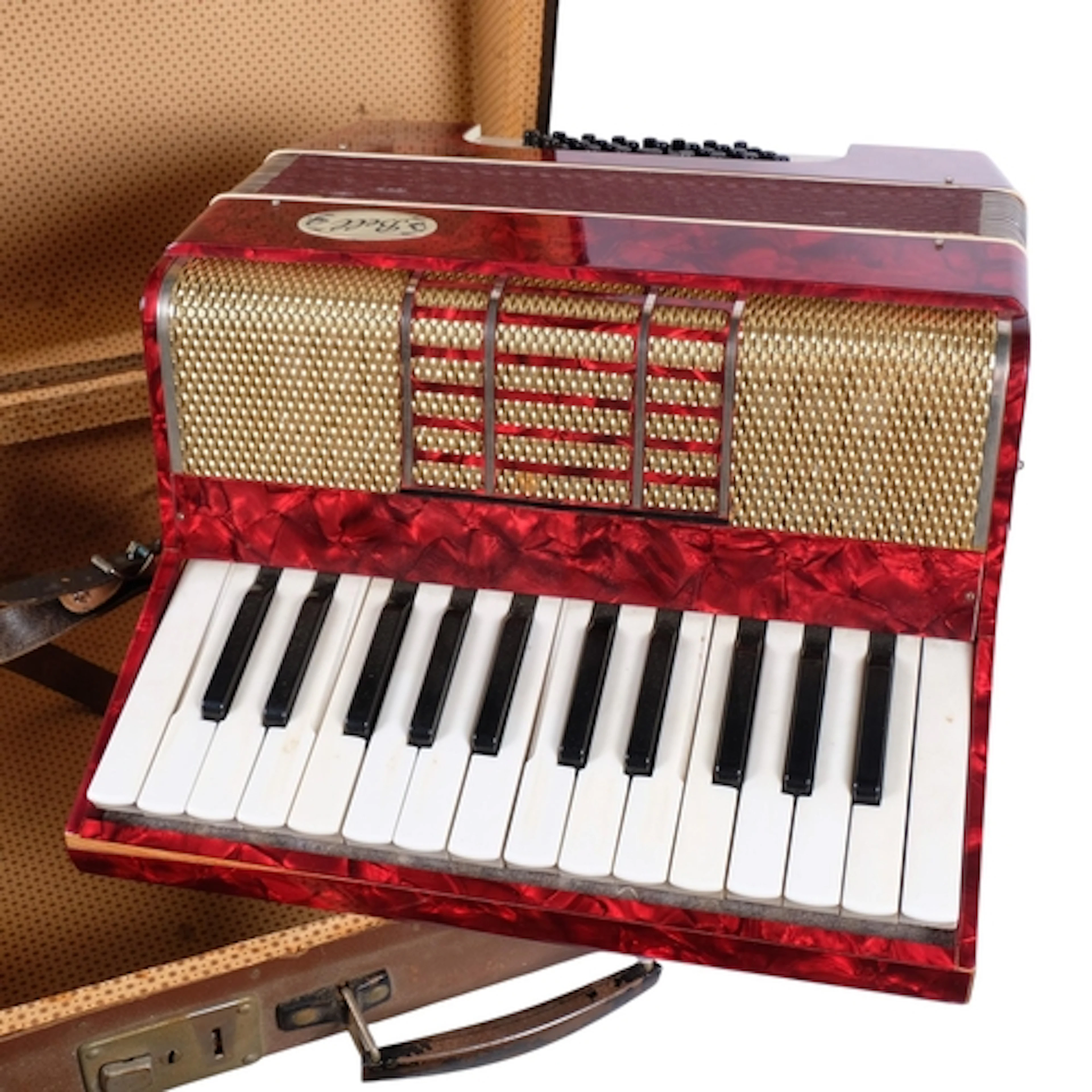 A mid-century Bell 32 base piano accordion in red pearl fini...