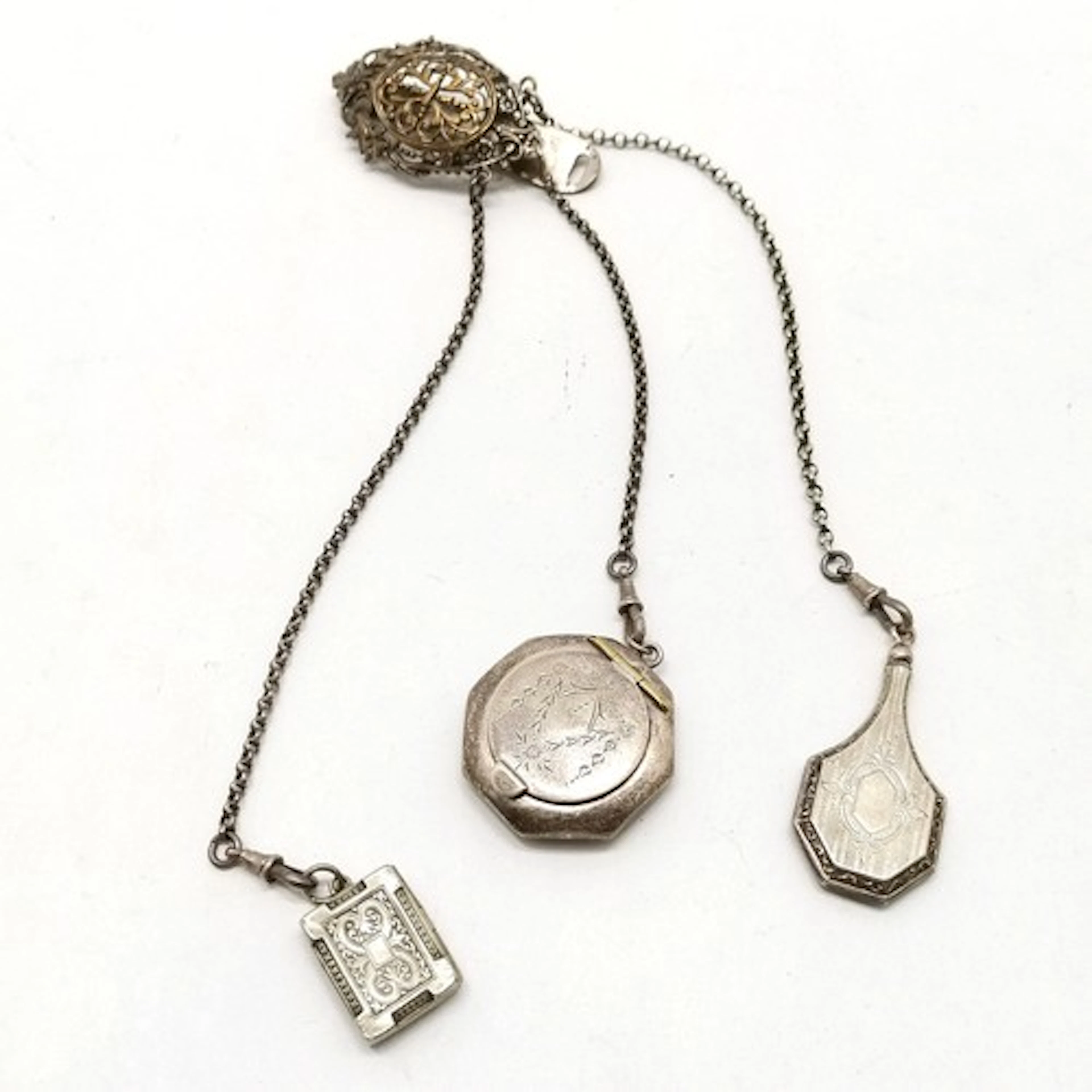 Antique chatelaine belt hook with 3 silver chains suspending...