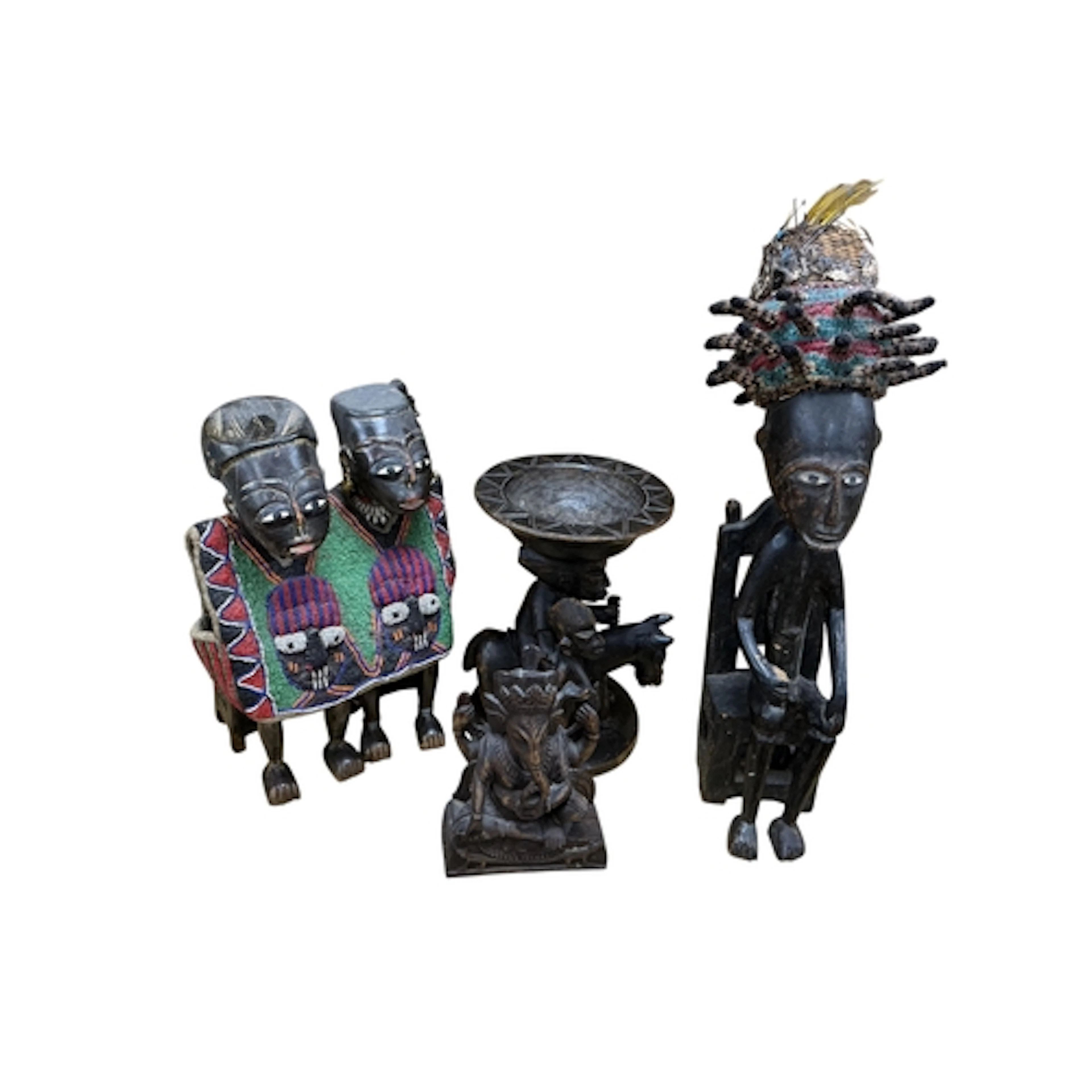 A Yoruba carved wood twins group with beadwork costume, heig...