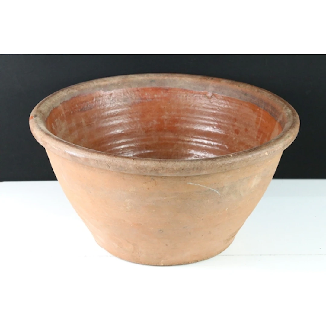 20th century terracotta dairy bowl, 22cm high x 44cm diamete...