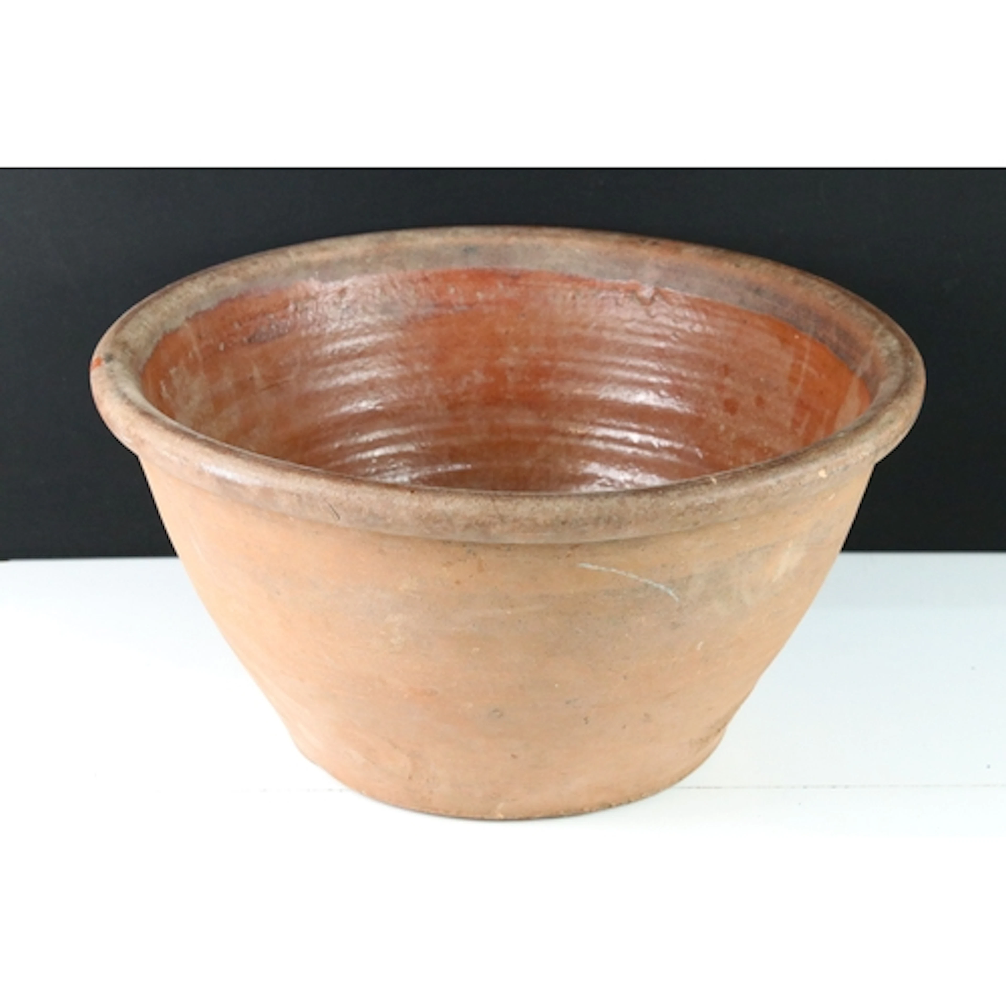 20th century terracotta dairy bowl, 22cm high x 44cm diamete...