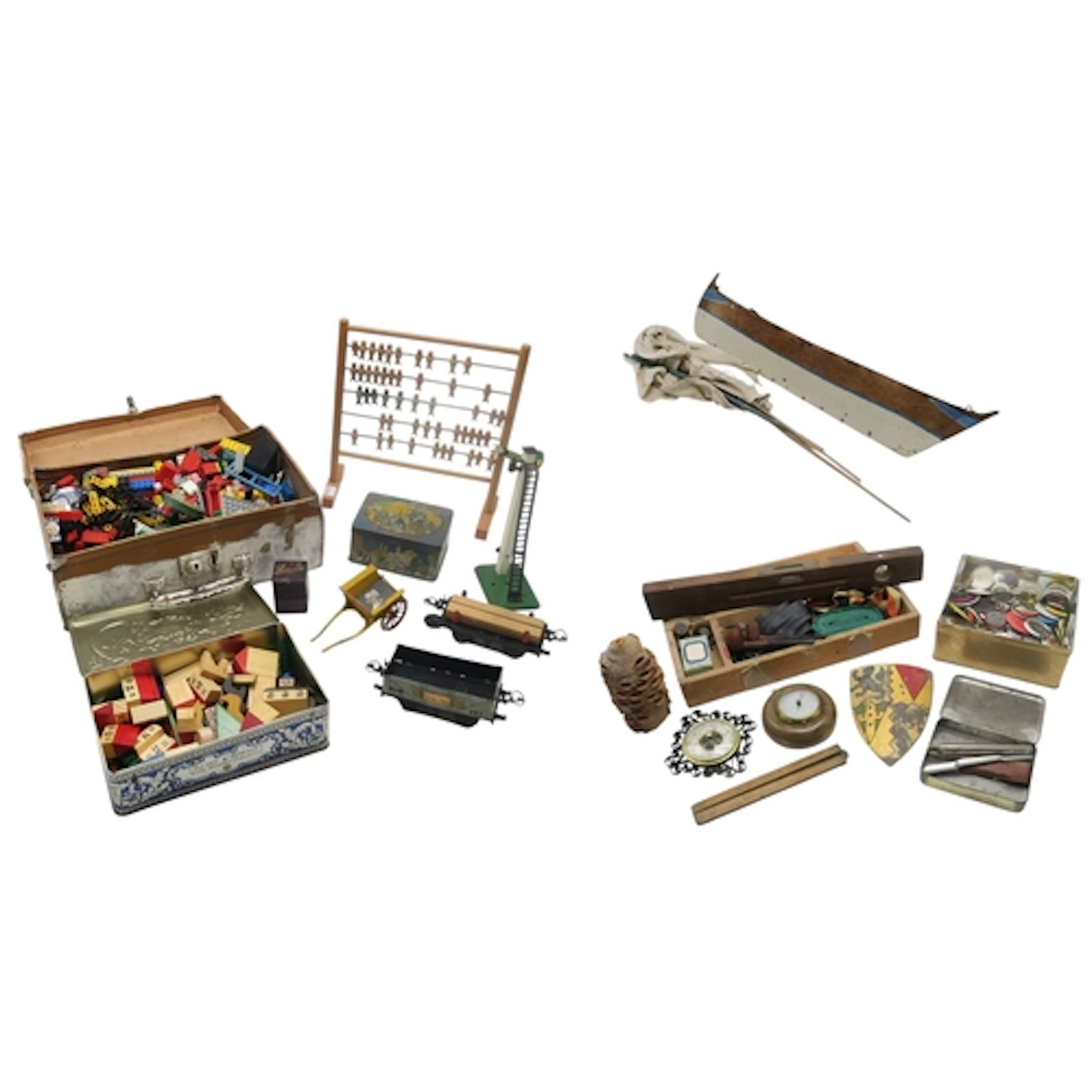 An eclectic mixed lot, comprising a wooden model yacht, a sm...