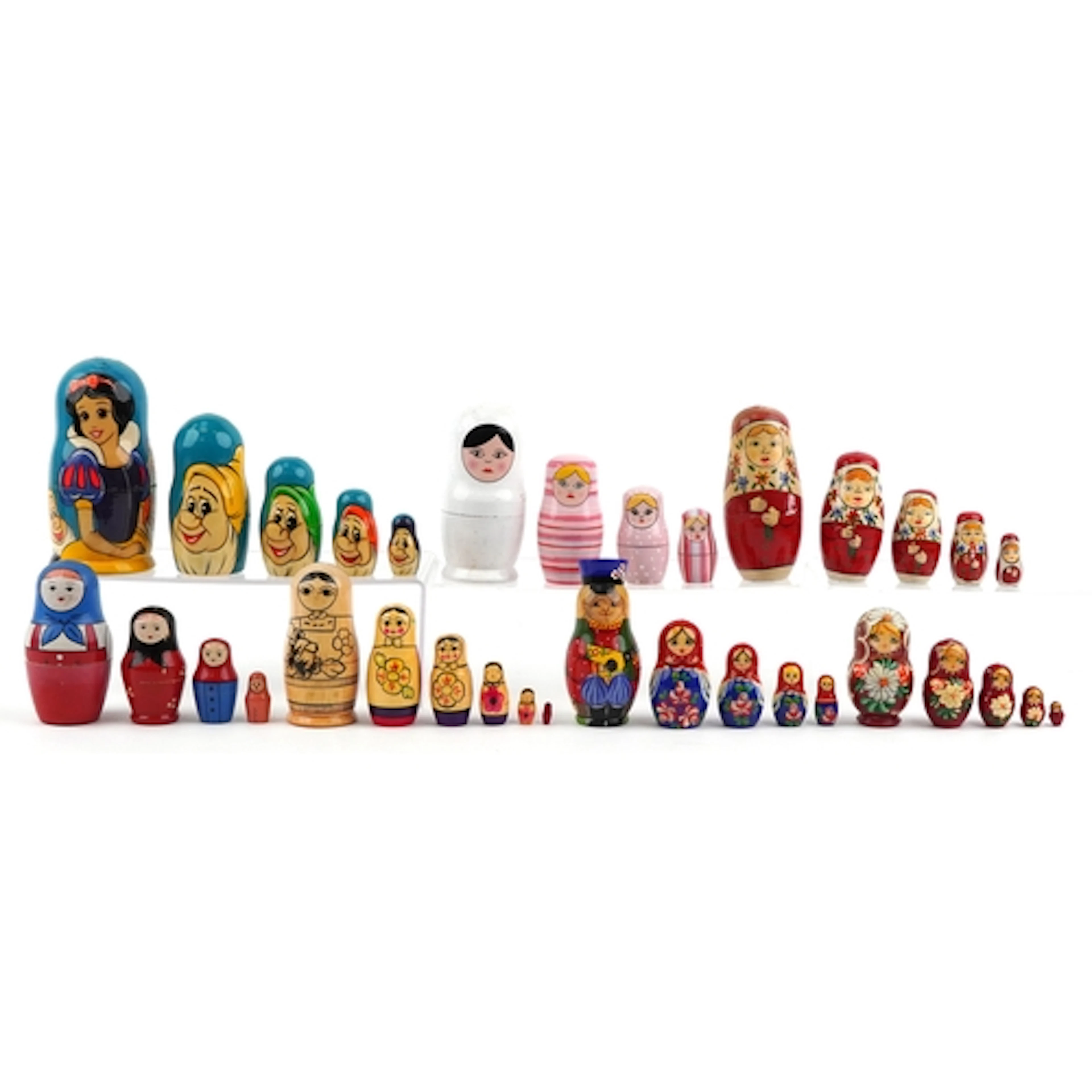 Seven vintage Russian Matryoshka dolls, the largest 17.5cm h...
