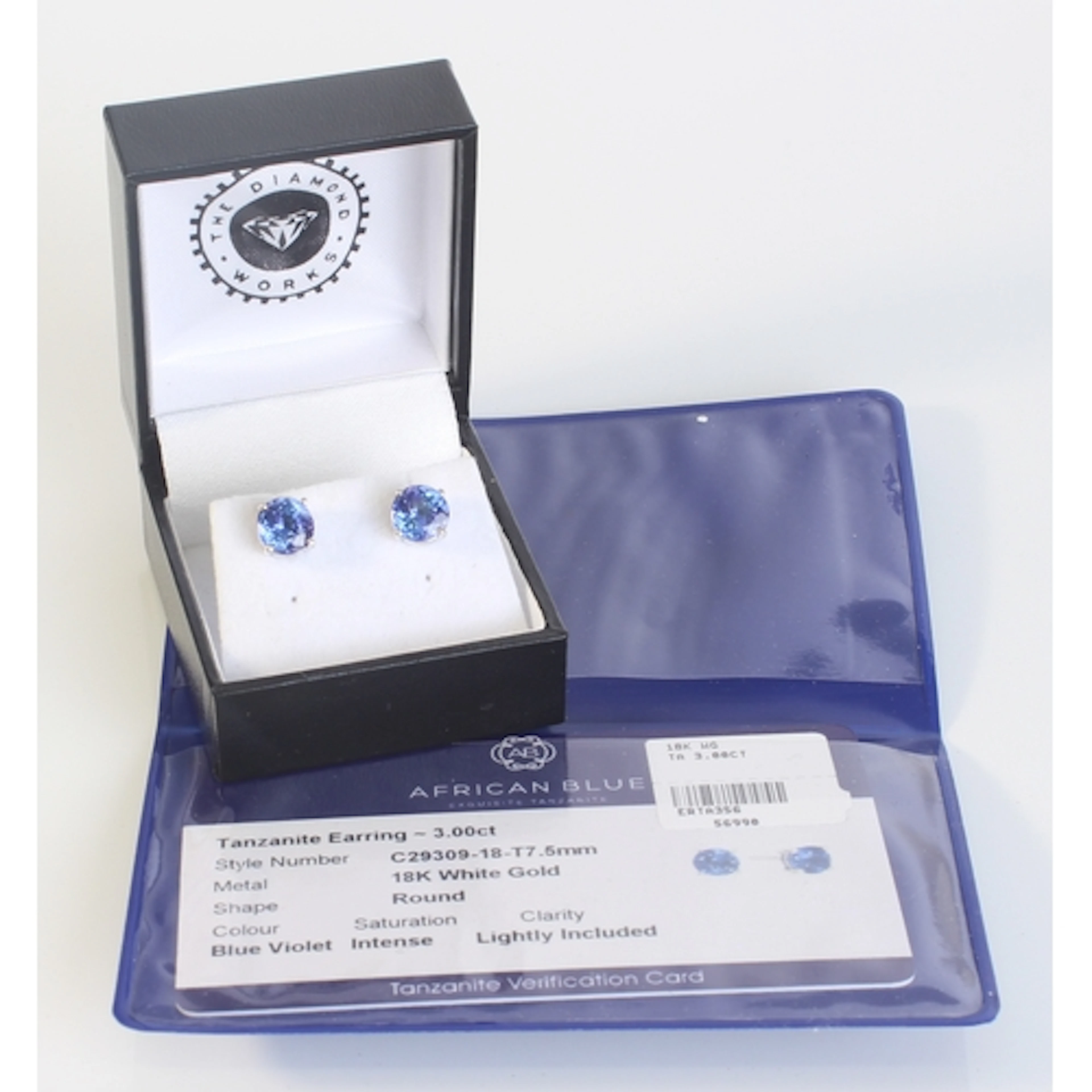 A pair of 18ct white gold and blue tanzanite stud earrings -...