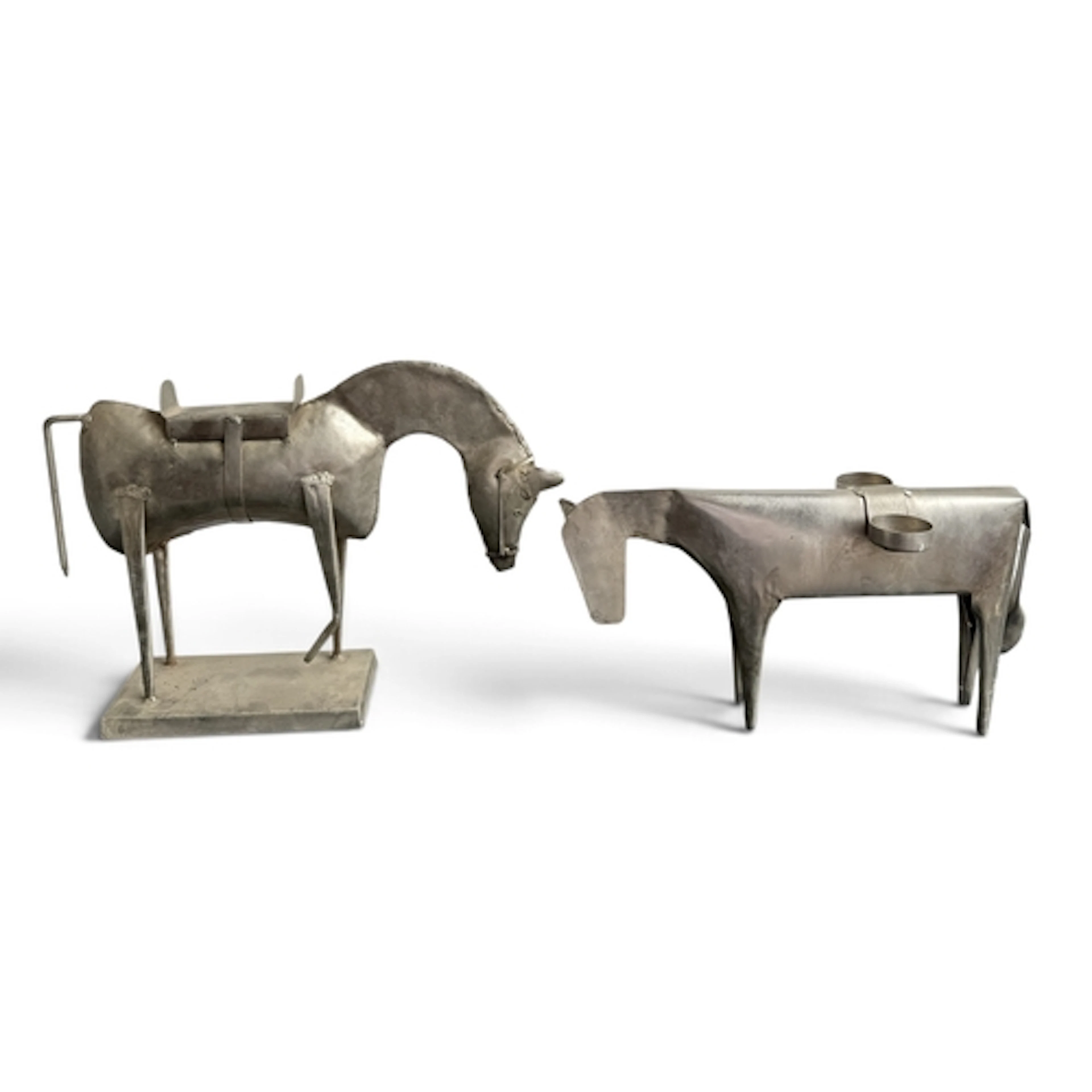 A METAL SCULPTURE OF A HORSE Together with another of a cow....