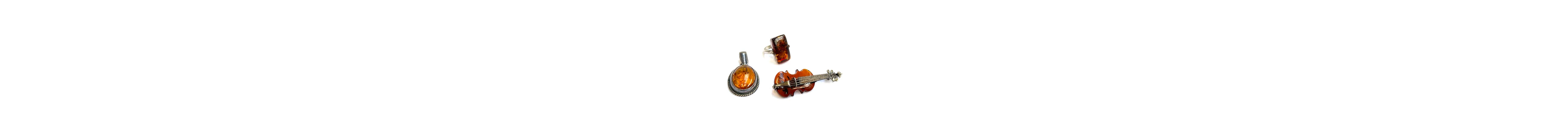 An amber and silver violin brooch, amber pendant, and amber ...