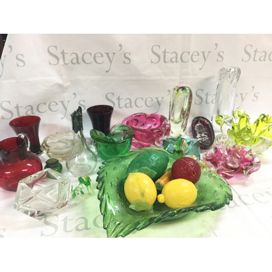 A collection of art glass ceramics including bowls, vases, j...