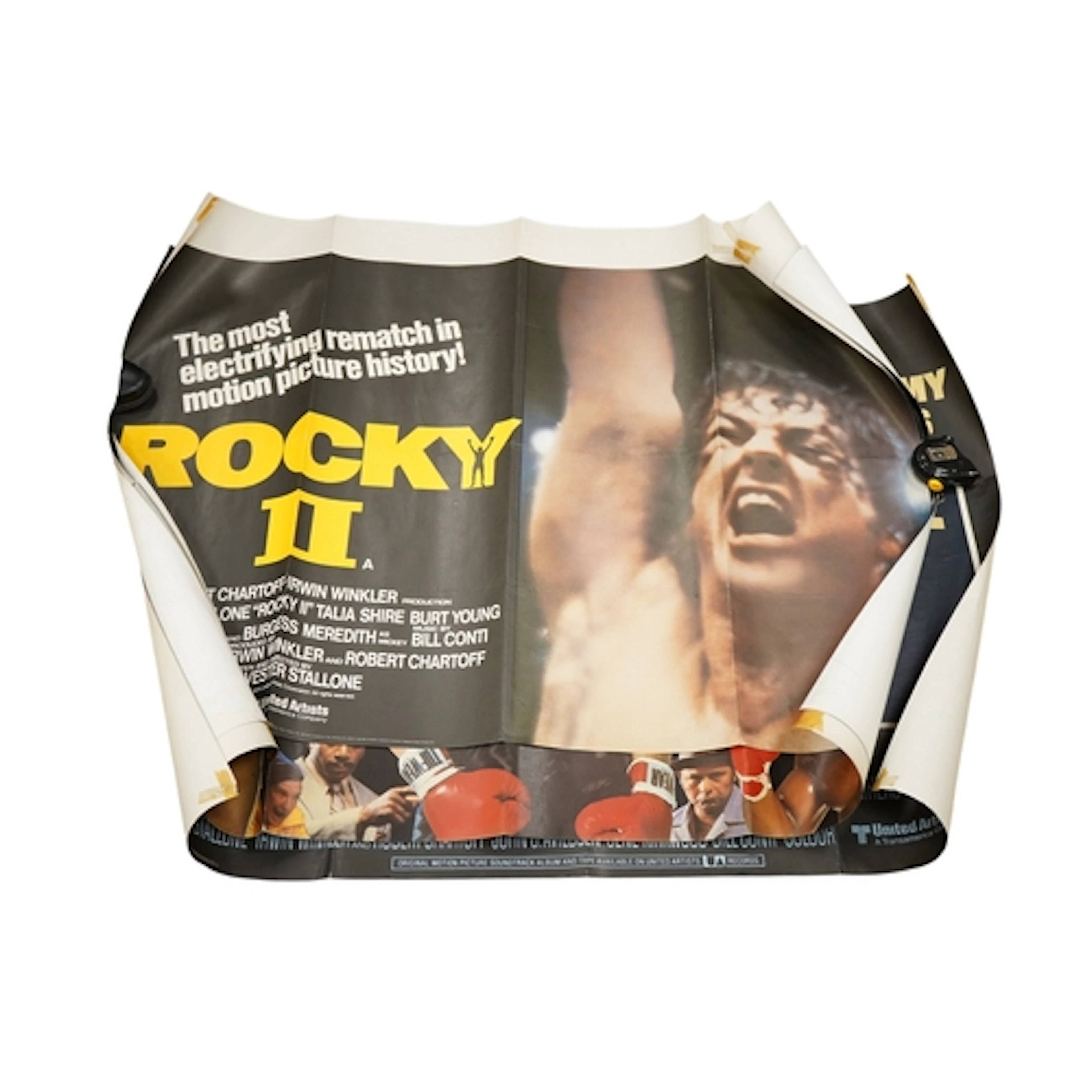 Four Rocky film posters; Rocky, Rocky II, Rocky IIIa, and Ro...