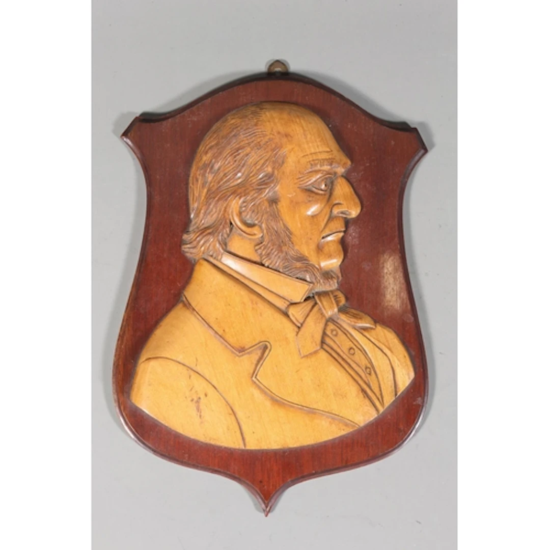 Carved wooden antique plaque depicting possibly William Glad...