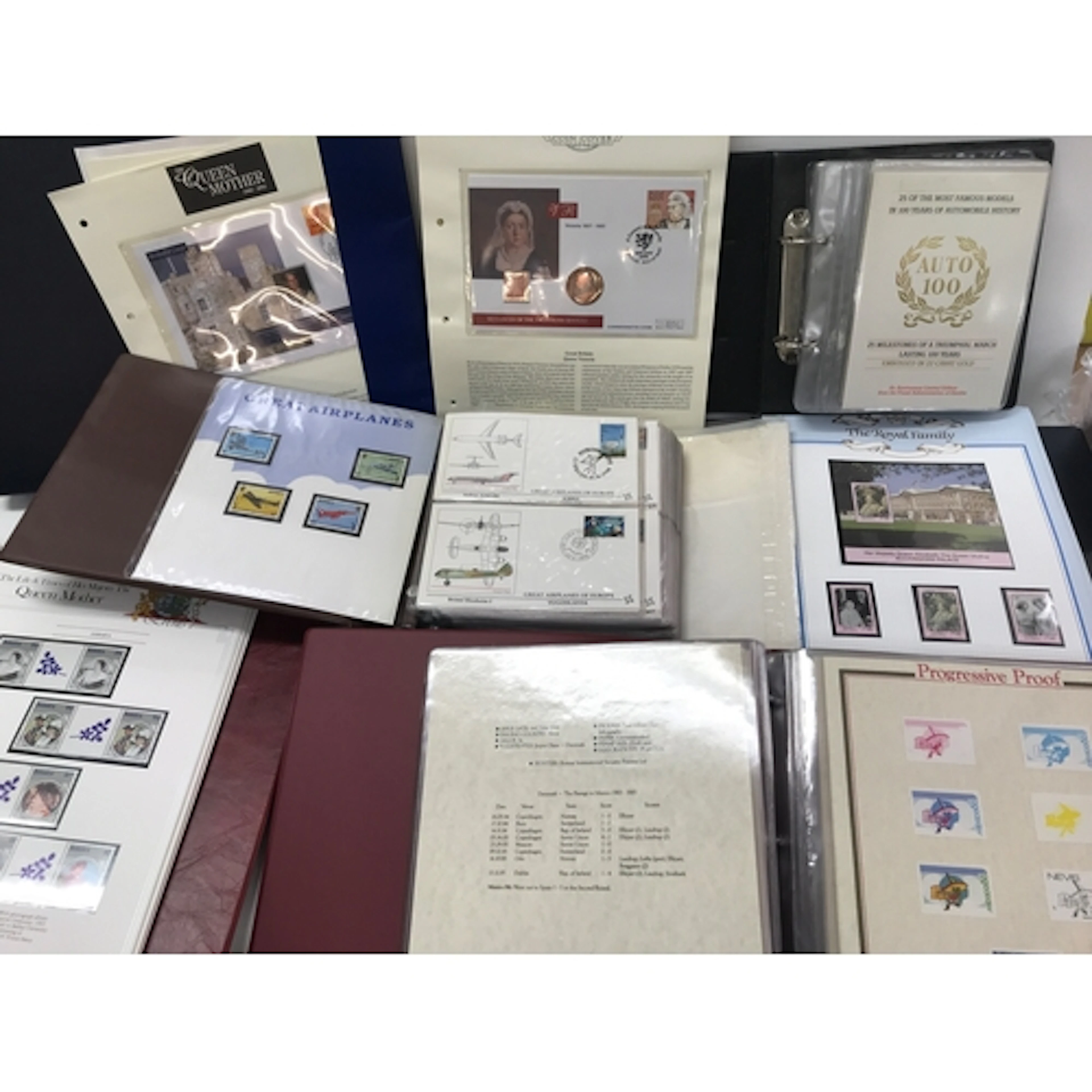 A large collection of stamps albums and coin covers. Includi...