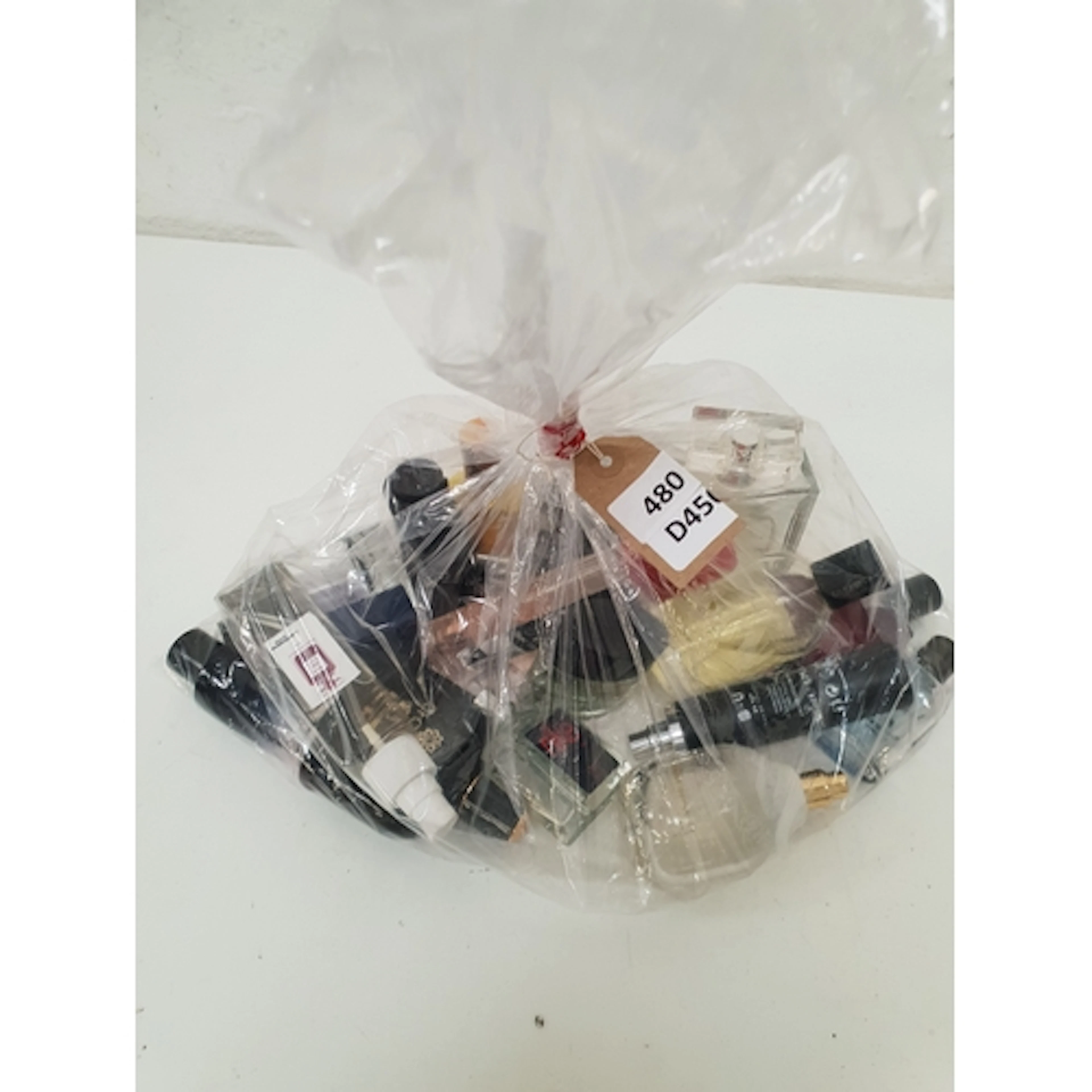ONE BAG OF USED PERFUME including Nike