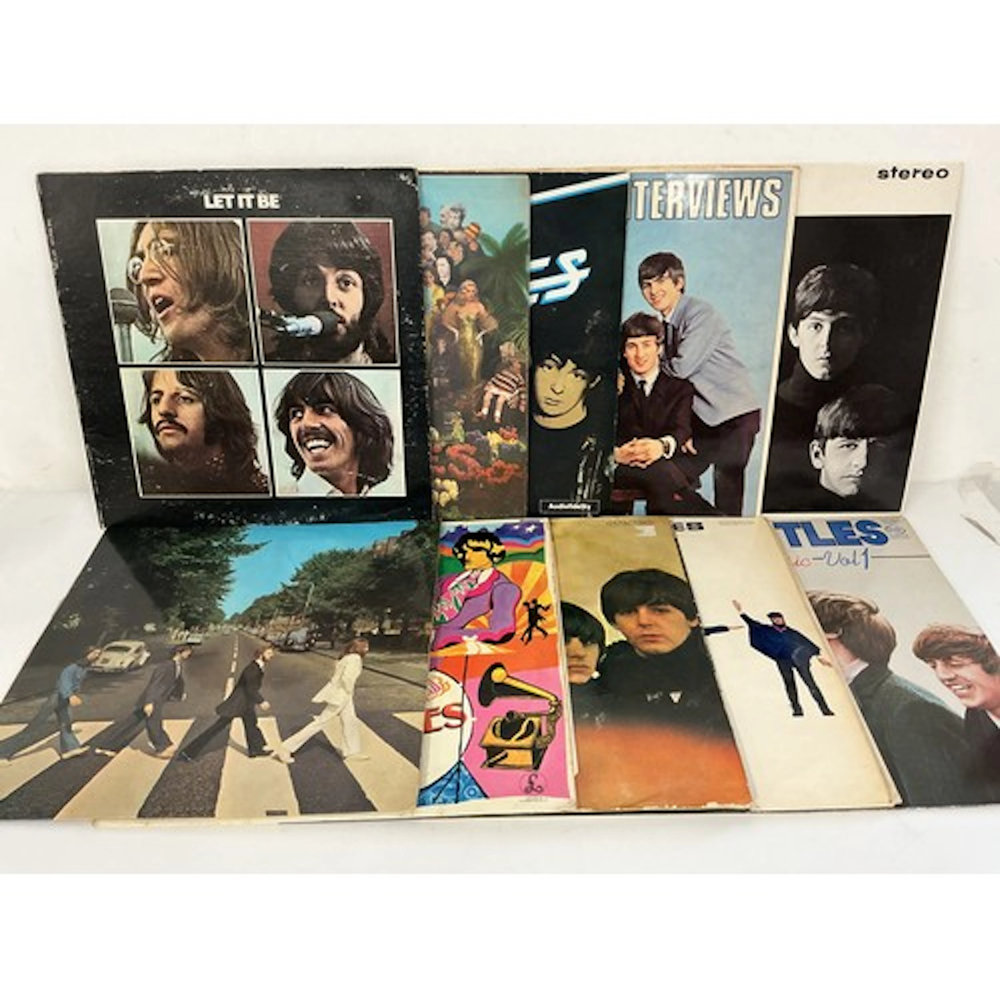 Ten Beatles LPs comprising a US pressing of Let It Be, Abbey...