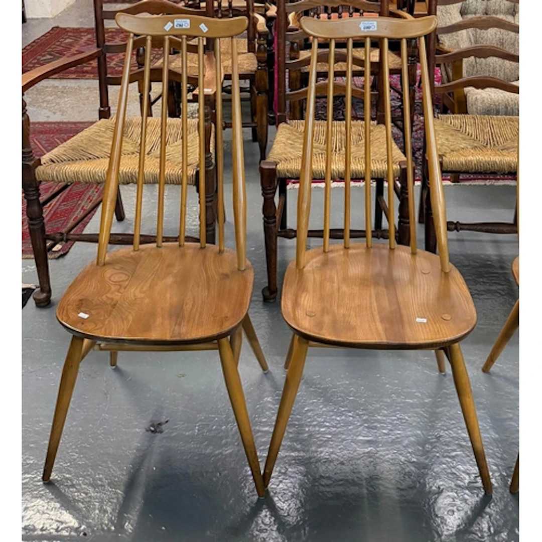 Pair of Ercol elm and beech 'Goldsmith' design comb backed d...