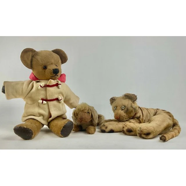 An early 20th century Steiff mohair plush lying tiger, with ...