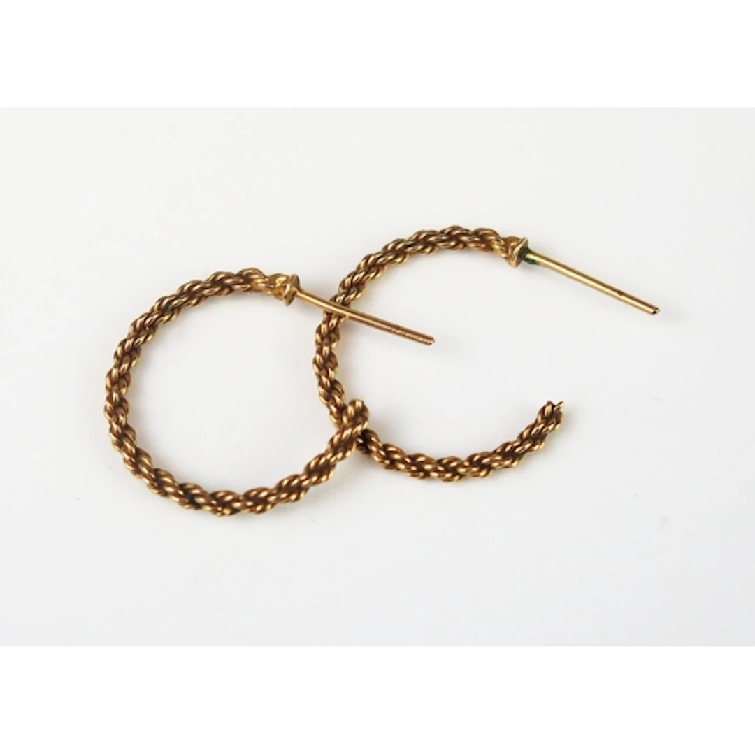 A pair of precious yellow metal rope twist half hoop earring...