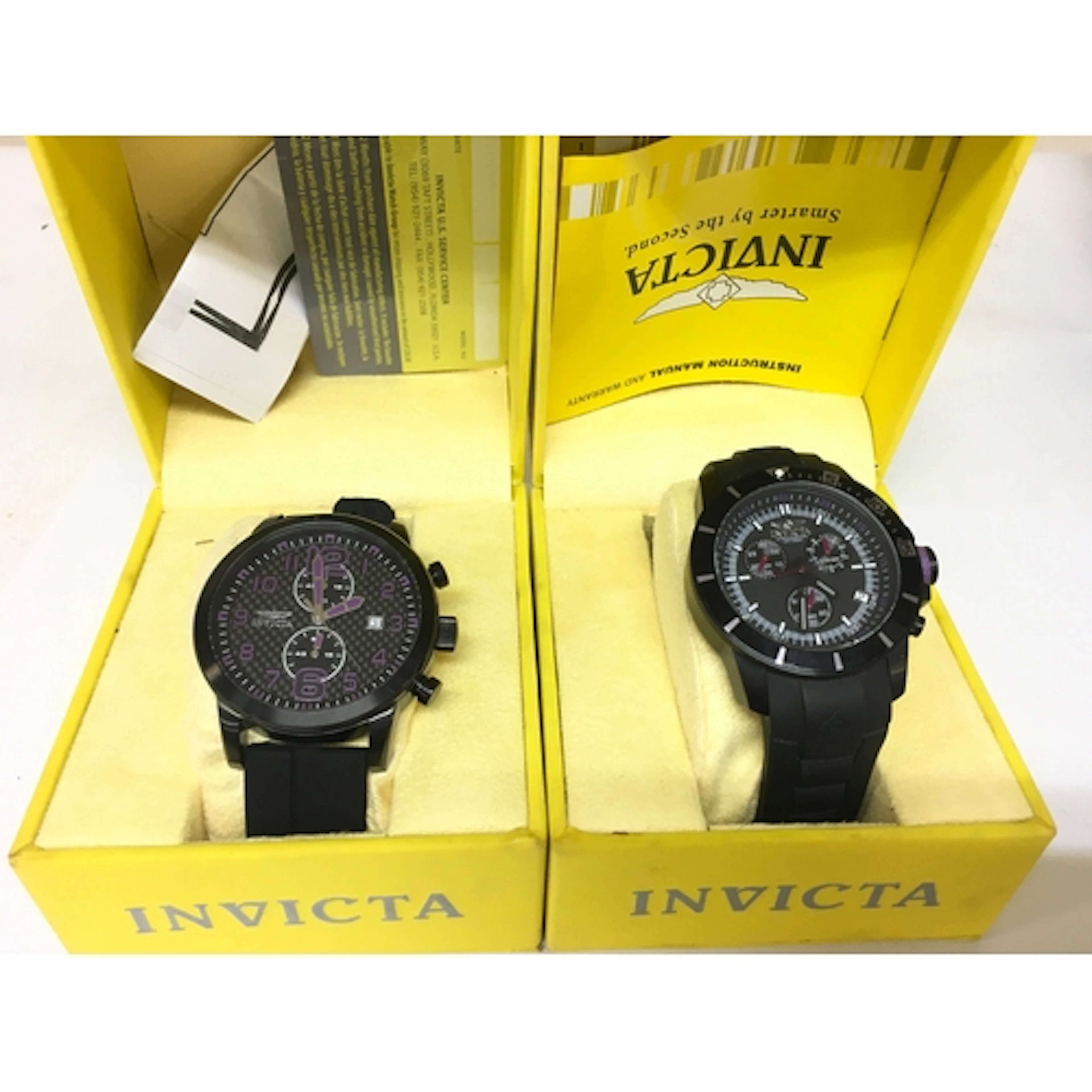 Two boxed gents Invicta wrist watches. Both seen running.