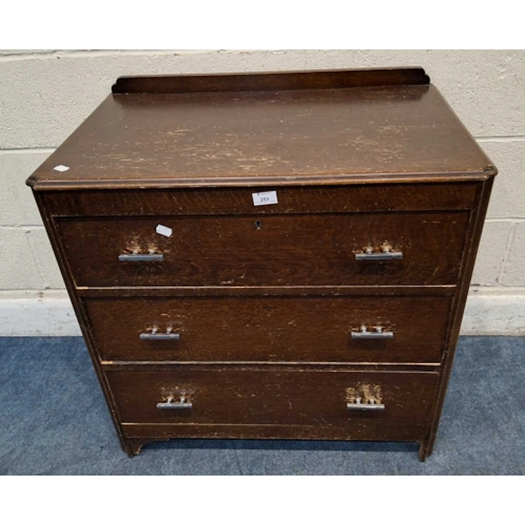 AN EARLY 20TH CENTURY OAK VENEER CHEST OF THREE DRAWERS (wi...