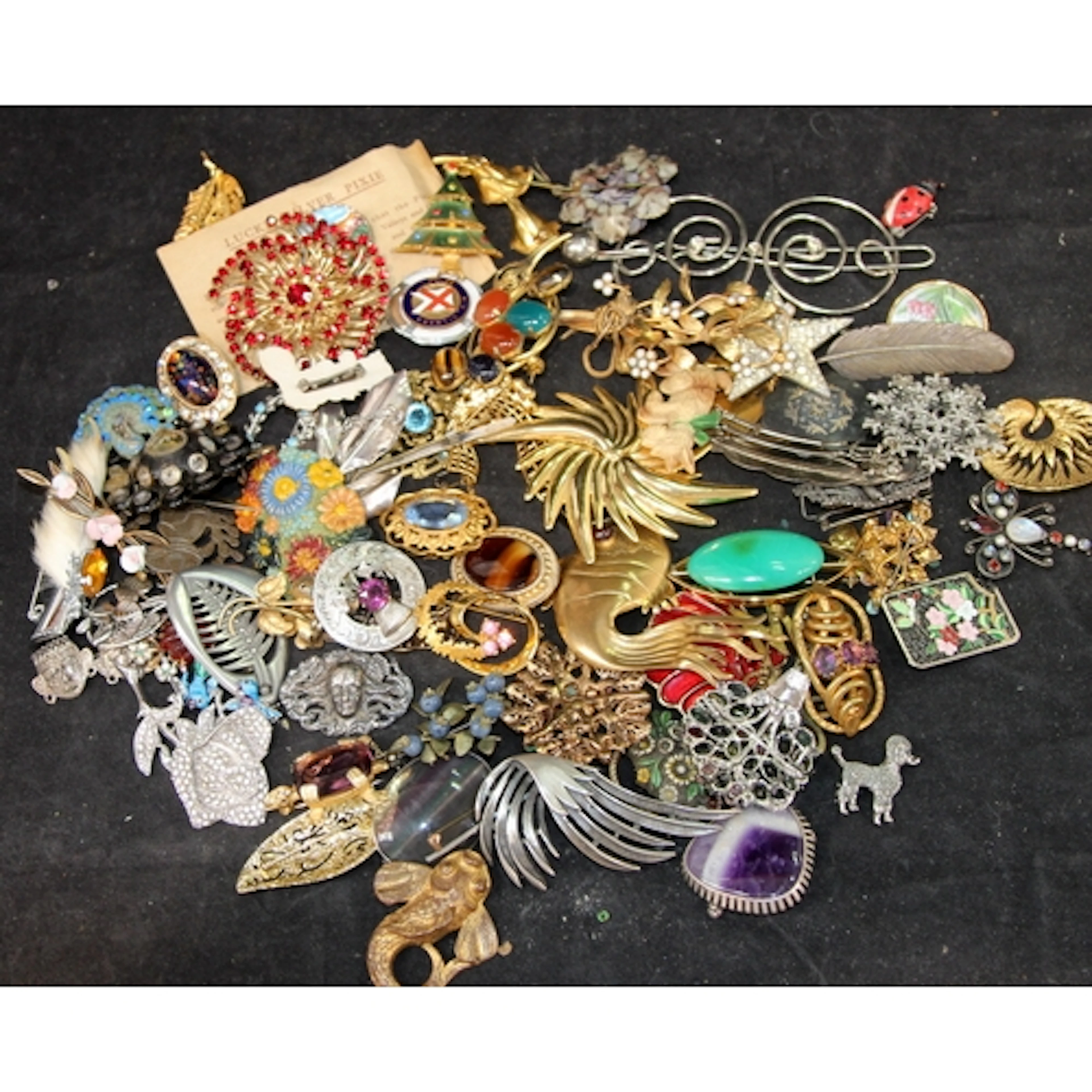 A collection of costume jewellery brooches, vintage and mode...
