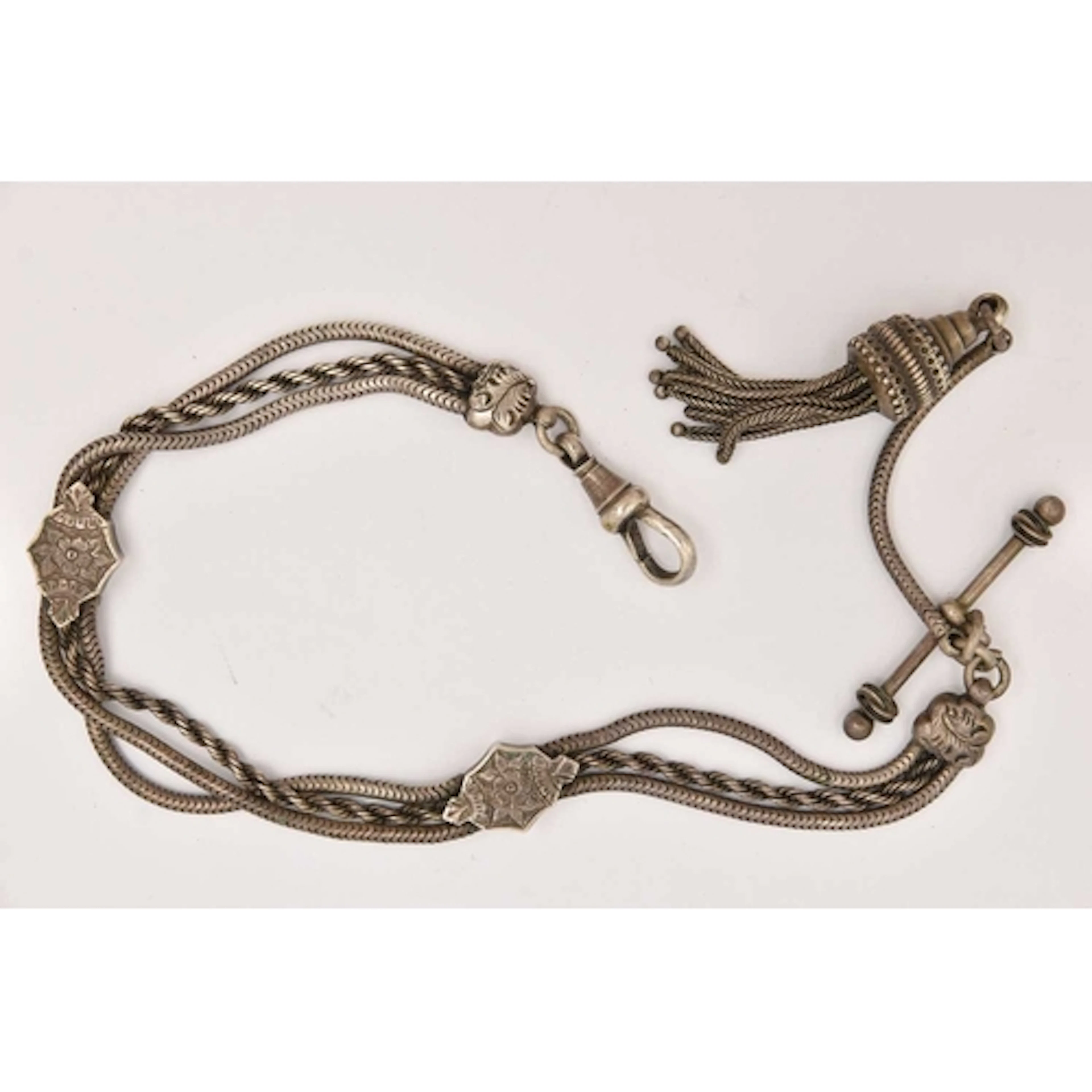 A WHITE METAL ALBERTINA CHAIN, comprised of two snake chains...
