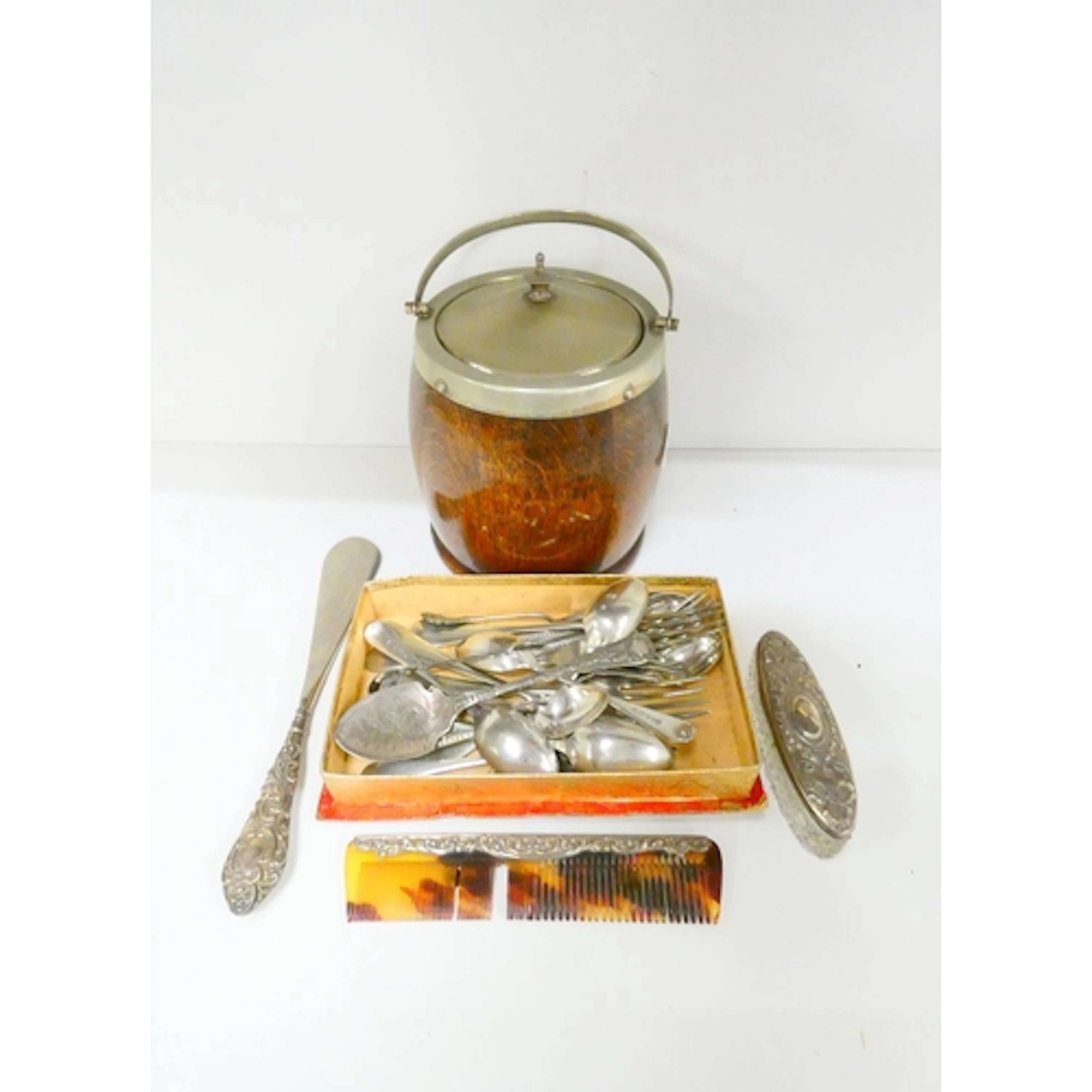 A silver tortoiseshell comb by Henry Bushell and Co Birmingh...